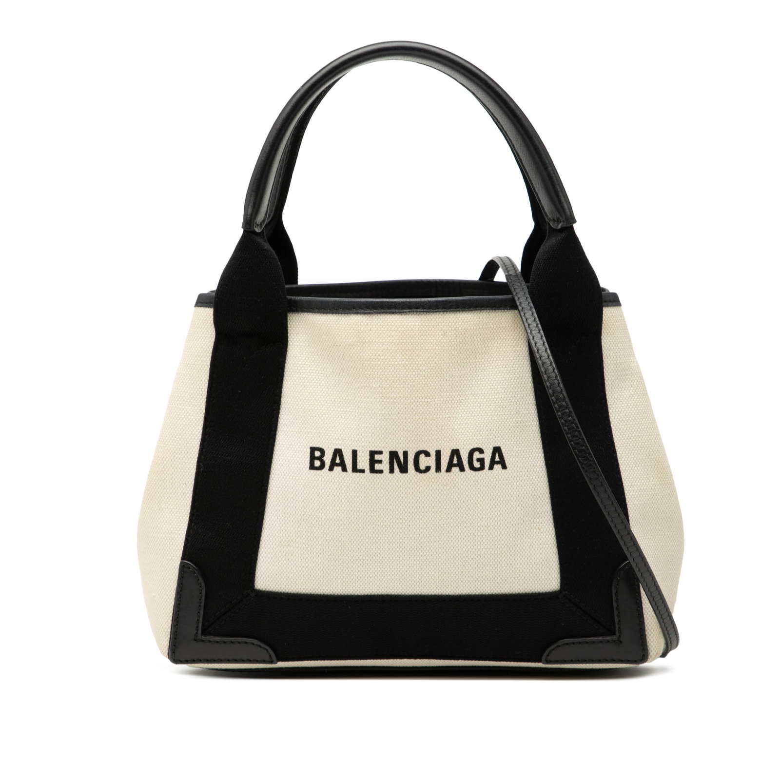 Balenciaga Navy Cabas XS Canvas Bag with Leather Trim and Pouch: Balenciaga Navy Cabas XS Canvas Bag with Leather Trim and Pouch This Balenciaga Canvas Navy Cabas XS features a durable canvas body with leather trim, flat leather handles, and a detachable strap for 