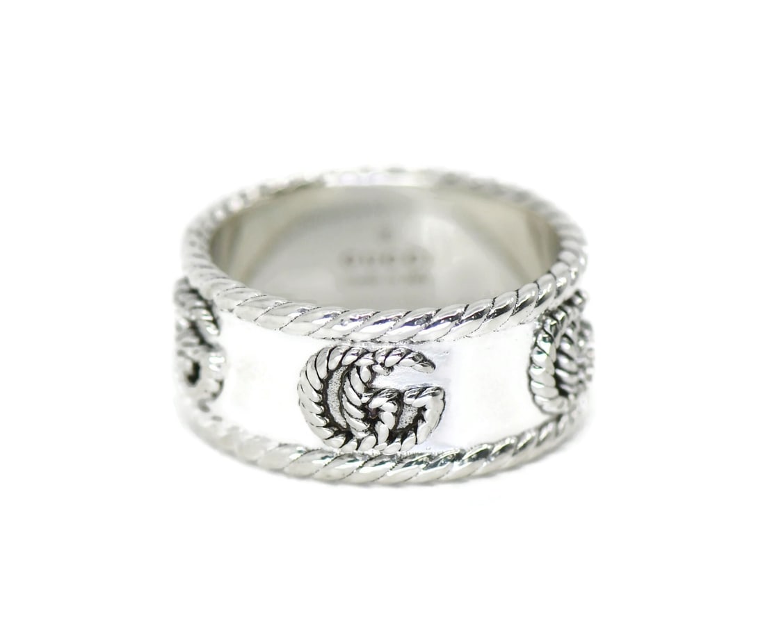 Sterling Silver Size 6 Ring by Gucci 925 Italian Jewelry: Sterling Silver Size 6 Ring by Gucci 925 Italian Jewelry This Gucci ring is crafted from sterling silver with a 925 metal purity and features a sleek design without any stones. It is an Italian-made p