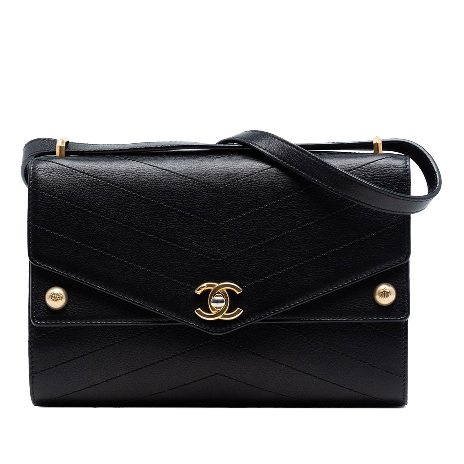 Black Leather Crossbody with CC Turn Lock and Chevron Quilting by Chanel: Black Leather Crossbody with CC Turn Lock and Chevron Quilting by Chanel This Chanel CC Chevron Calfskin Casual Trip Flap crossbody bag features a black leather body with a chevron pattern, a flat lea