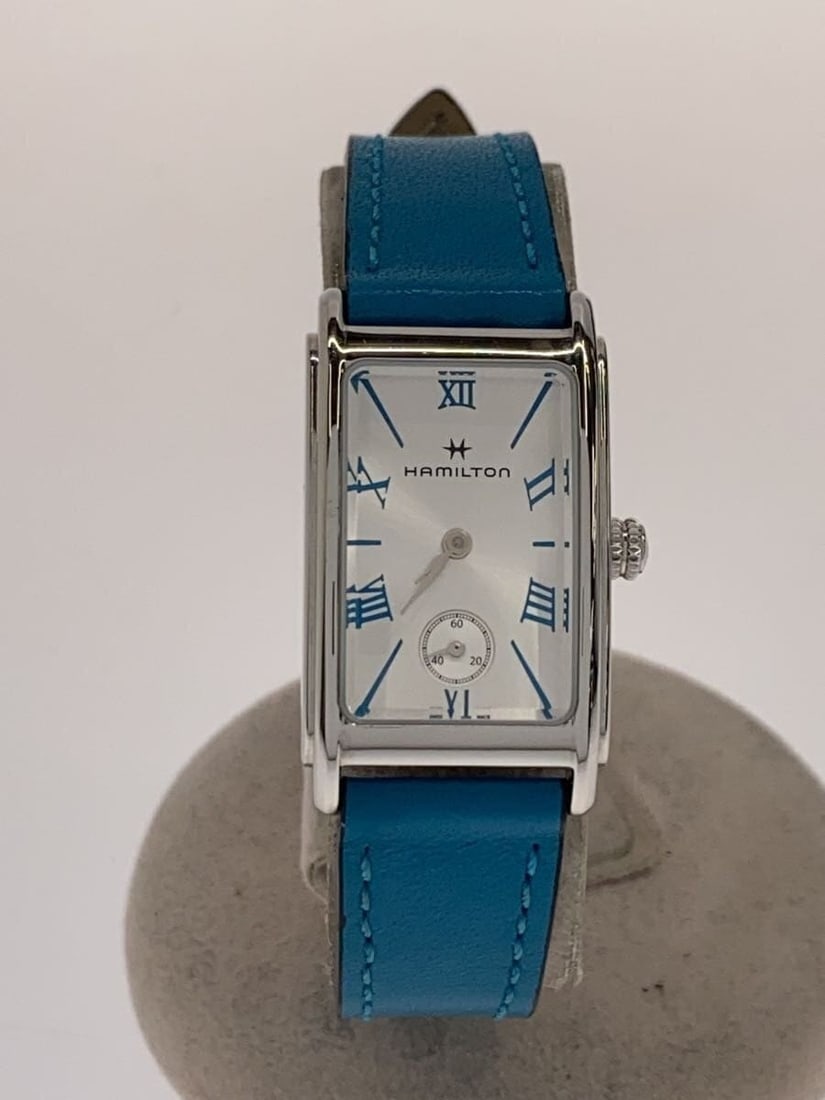 Hamilton Ardmore H112210 Swiss Quartz Silver Ladies Wristwatch: Hamilton Ardmore H112210 Swiss Quartz Silver Ladies Wristwatch This Hamilton Ardmore H112210 women's wristwatch features a blue dial and a silver case. Designed for women, it is powered by a quartz mo
