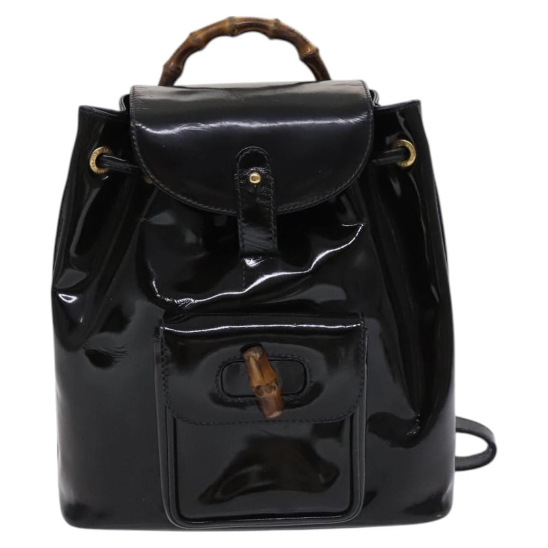 Black Patent Leather Gucci Vintage Bamboo Backpack Purse Italy: Black Patent Leather Gucci Vintage Bamboo Backpack Purse Italy This Gucci Vintage Bamboo Backpack is crafted from black patent leather and features the iconic bamboo detail. Designed for women, it off