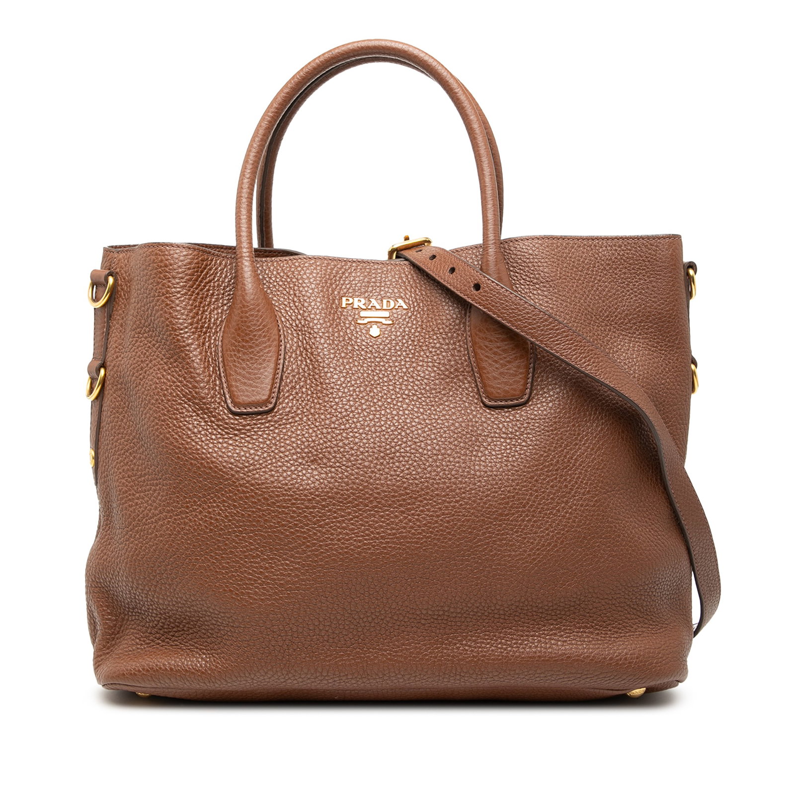Prada Vitello Daino Brown Leather Convertible Satchel with Shoulder Strap: Prada Vitello Daino Brown Leather Convertible Satchel with Shoulder Strap This Prada Vitello Daino Open Convertible Tote is crafted from brown leather and features rolled leather handles and a detacha