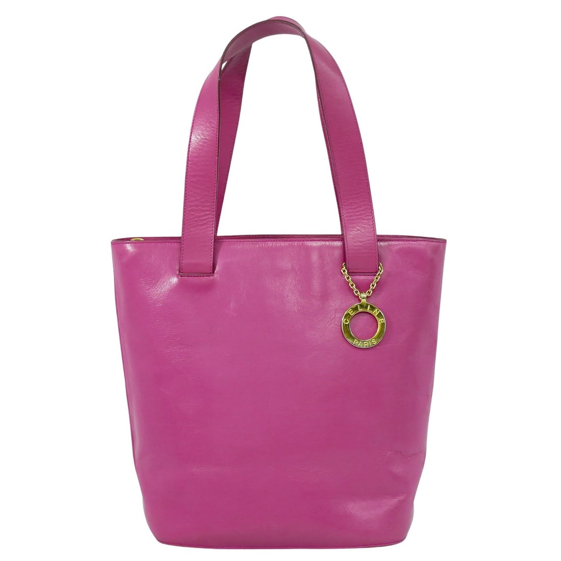 Celine Pink Leather Tote Handbag 23cm x 28cm x 15cm Italy: Celine Pink Leather Tote Handbag 23cm x 28cm x 15cm Italy This Celine tote bag is crafted from pink leather and designed for women. It features a spacious interior and comfortable handles. The bag sho