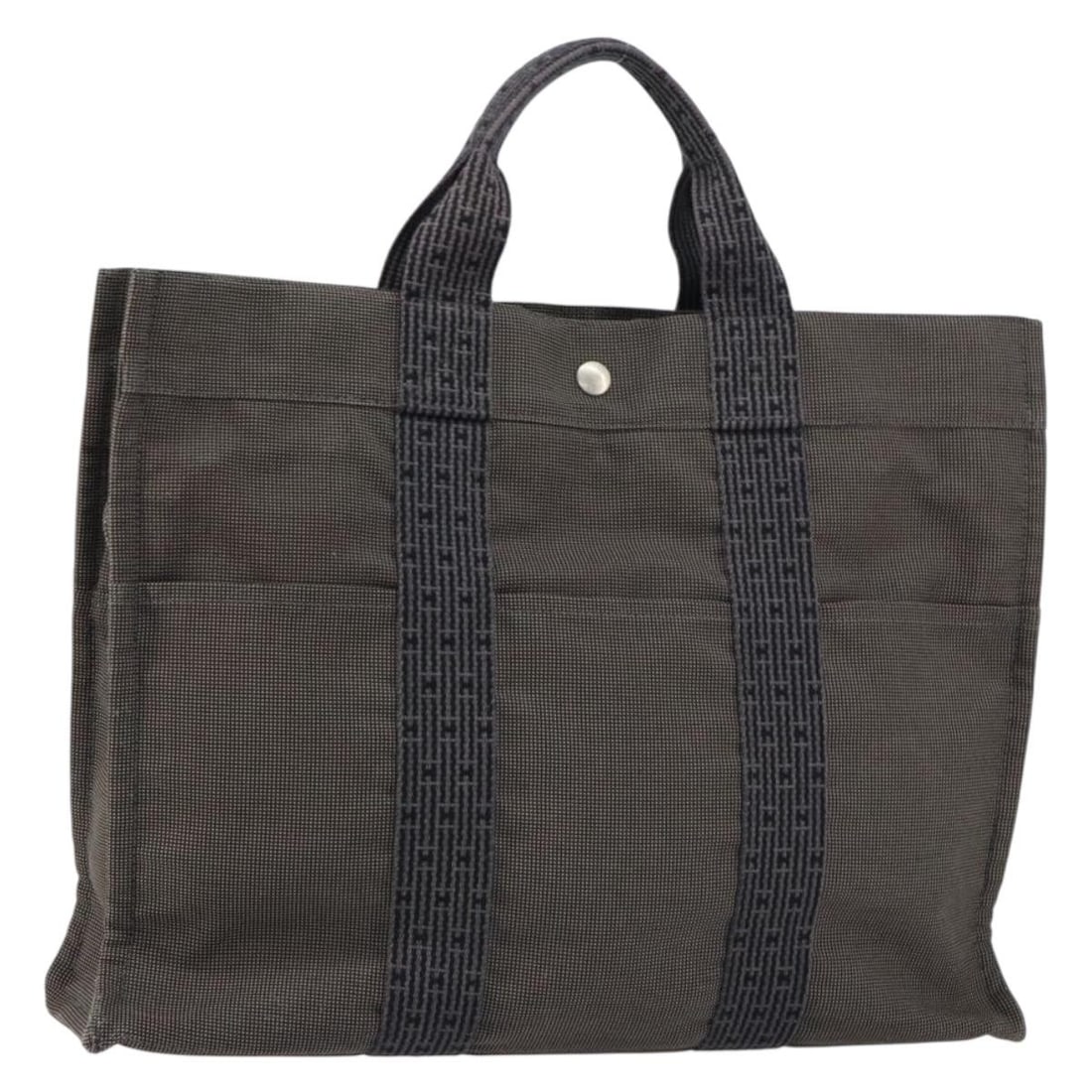 Hermes Gray Canvas Fourre-tout Herline Tote Bag 44cm: Hermes Gray Canvas Fourre-tout Herline Tote Bag 44cm This pre-owned Hermes Fourre-tout Herline handbag for women features gray canvas construction with metal fittings. It measures 44cm x 32cm x 10cm a