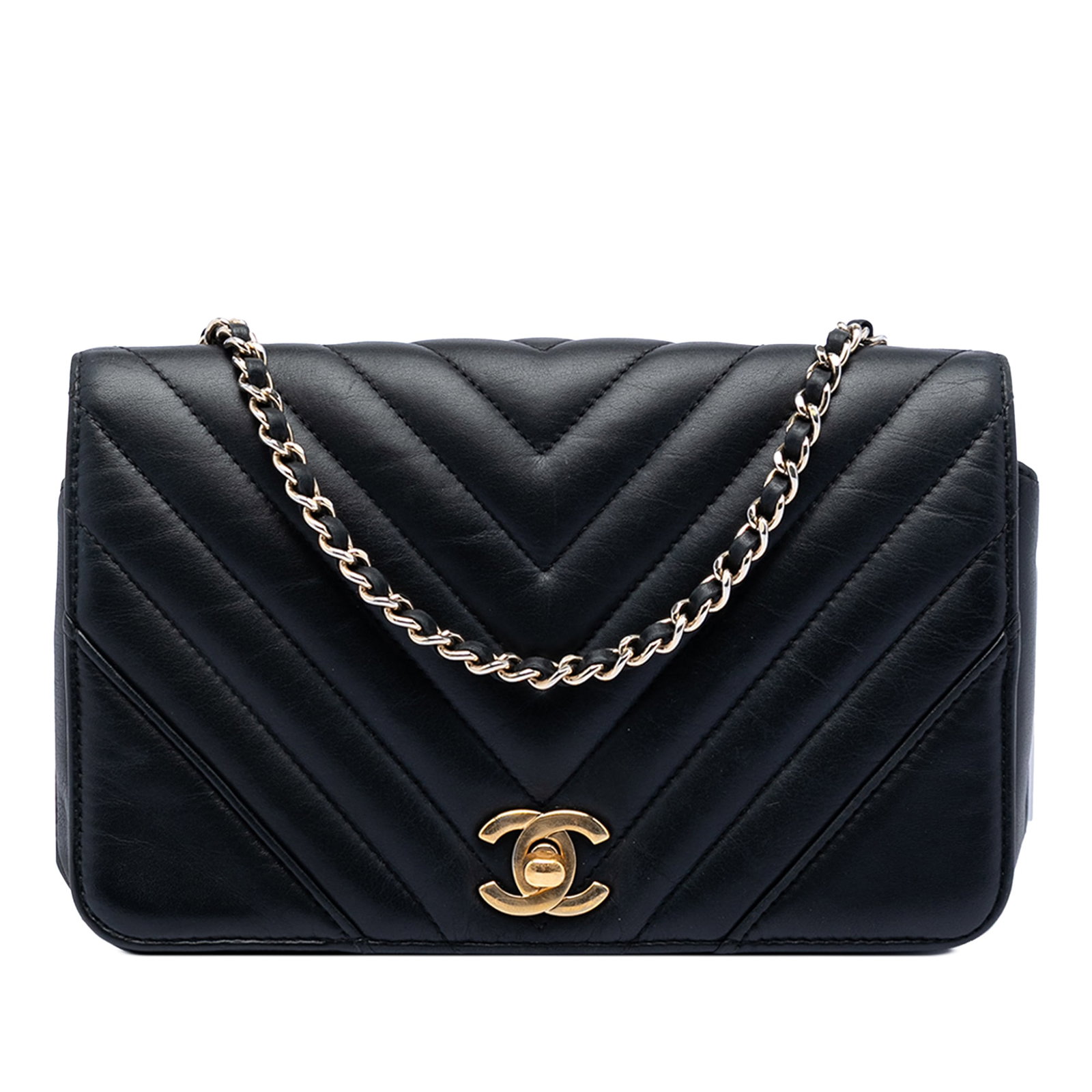 Black Chanel Mini Chevron Leather Crossbody Bag with Chain Strap: Black Chanel Mini Chevron Leather Crossbody Bag with Chain Strap This Chanel Mini Chevron Calfskin Statement Flap crossbody bag features a black quilted leather body with a distinctive chevron pattern