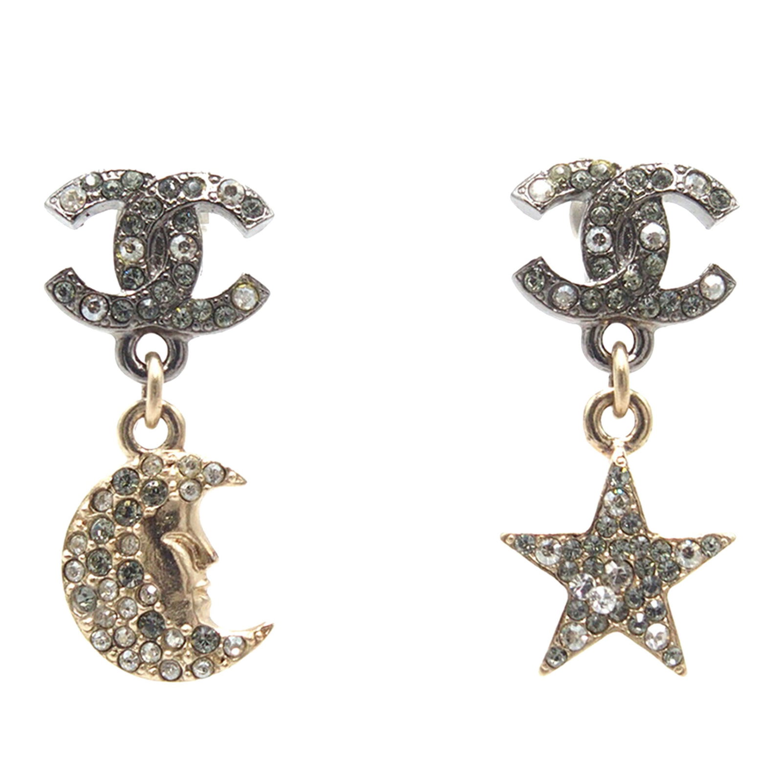 Chanel Crystal Moon and Star Drop Earrings in Silver and Gold Tone: Chanel Crystal Moon and Star Drop Earrings in Silver and Gold Tone These Chanel drop earrings feature gold and silver tone metal bodies with moon and star-shaped charms. The earrings are adorned with 