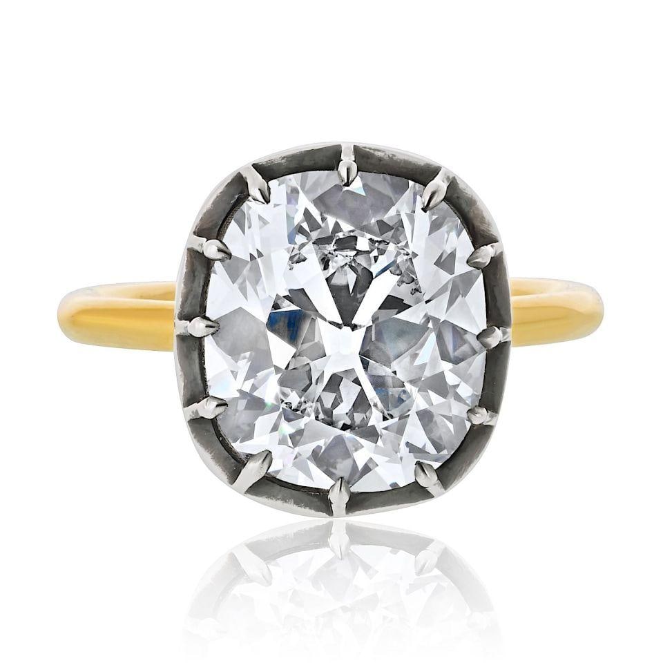 5.03 Carat GIA F/VS1 Cushion Cut Diamond Engagement Ring in 18K Gold: 5.03 Carat GIA F/VS1 Cushion Cut Diamond Engagement Ring in 18K Gold This exquisite engagement ring features a stunning 5.03 carat Cushion Brilliant Cut diamond, graded F color and VS1 clarity by GIA,