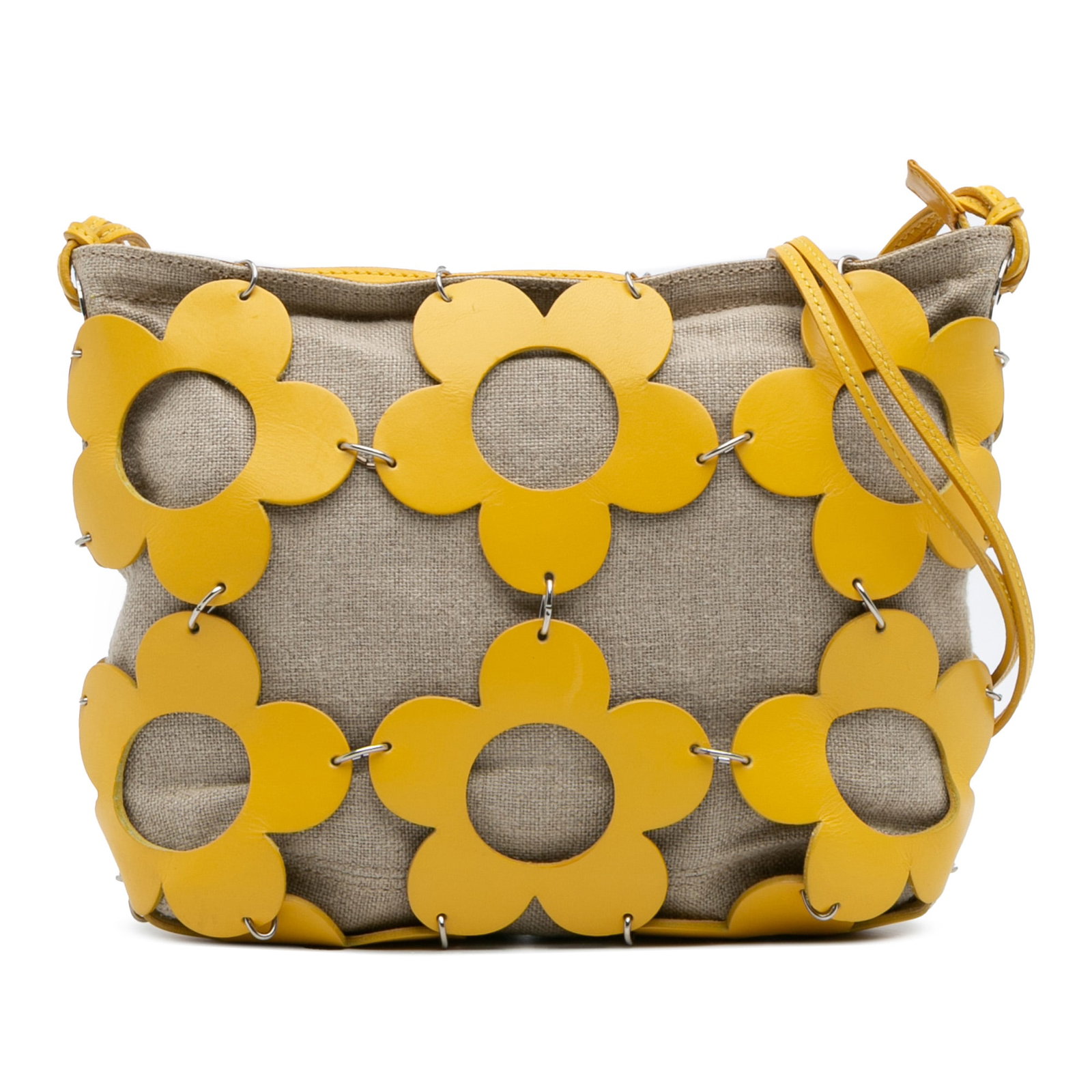 Celine Flower Cutout Canvas Leather Crossbody Bag Beige: Celine Flower Cutout Canvas Leather Crossbody Bag Beige This Celine crossbody bag features a cutout flower design crafted from canvas and leather, complemented by flat leather straps and a top zip clo