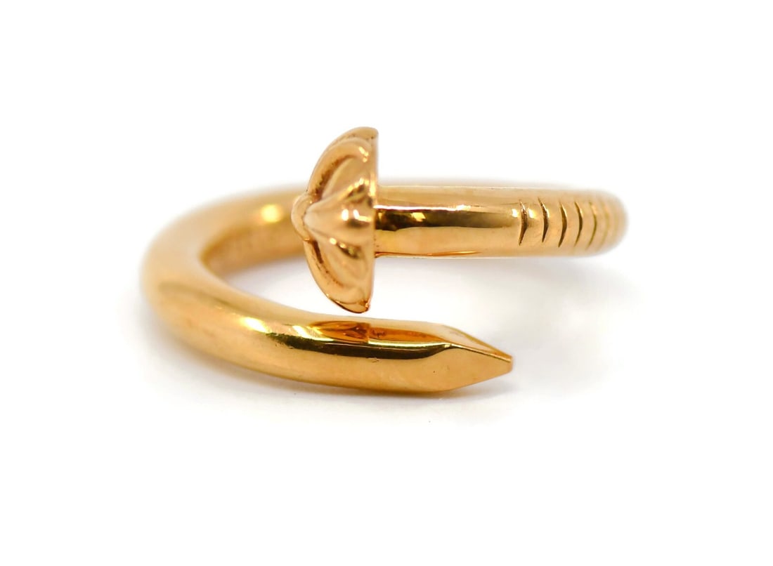 Chrome Hearts 22K Rose Gold Crossball Nail Ring Size 4 Authentic: Chrome Hearts 22K Rose Gold Crossball Nail Ring Size 4 Authentic This exquisite Chrome Hearts Crossball Nail ring is crafted from 22K rose gold, offering a luxurious and warm hue. The ring features a 