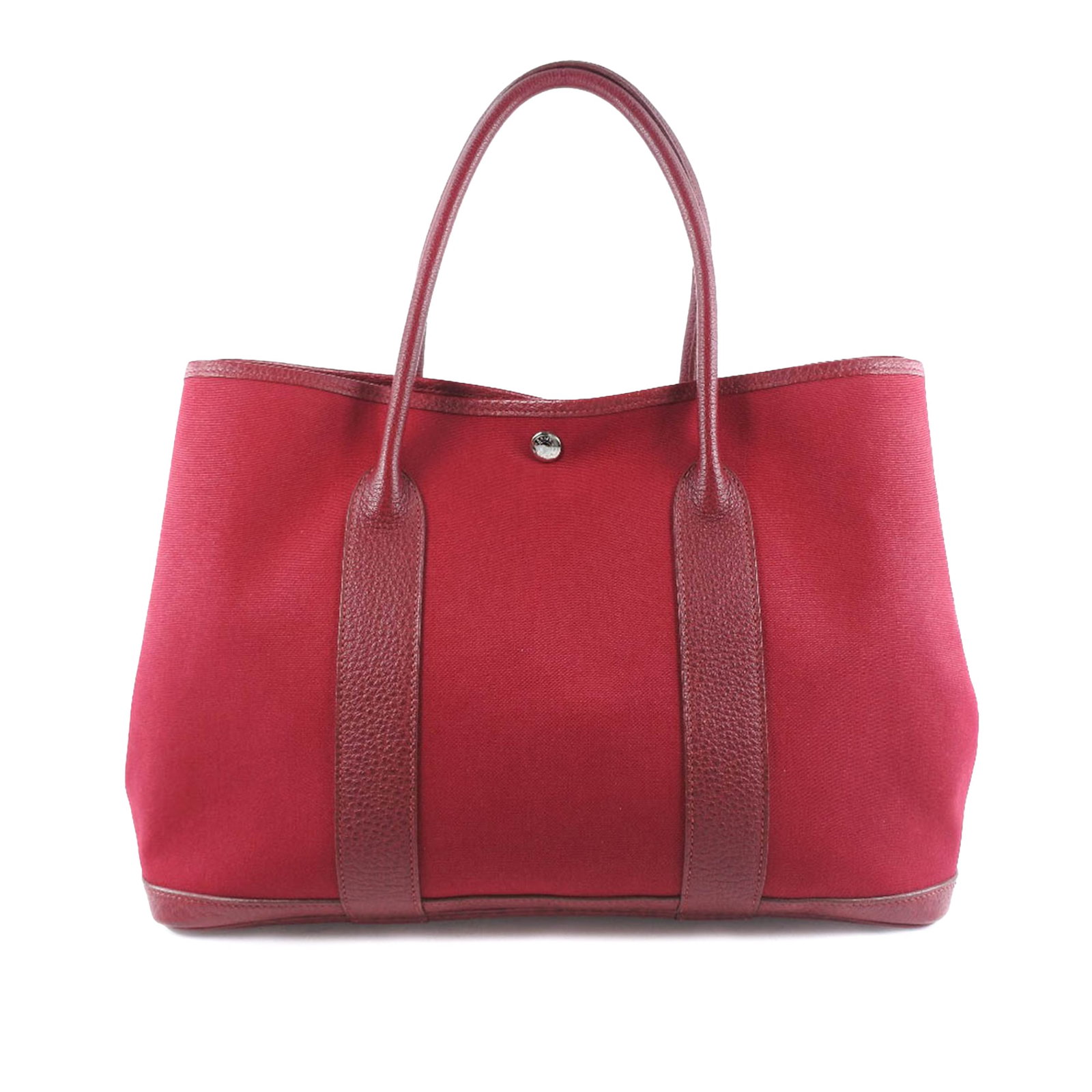 Hermes Garden Party 36 Red Canvas and Negonda Leather Tote Bag: Hermes Garden Party 36 Red Canvas and Negonda Leather Tote Bag This Hermes Garden Party 36 features a canvas and Negonda leather body with rolled leather handles and an open top secured by a snap butt