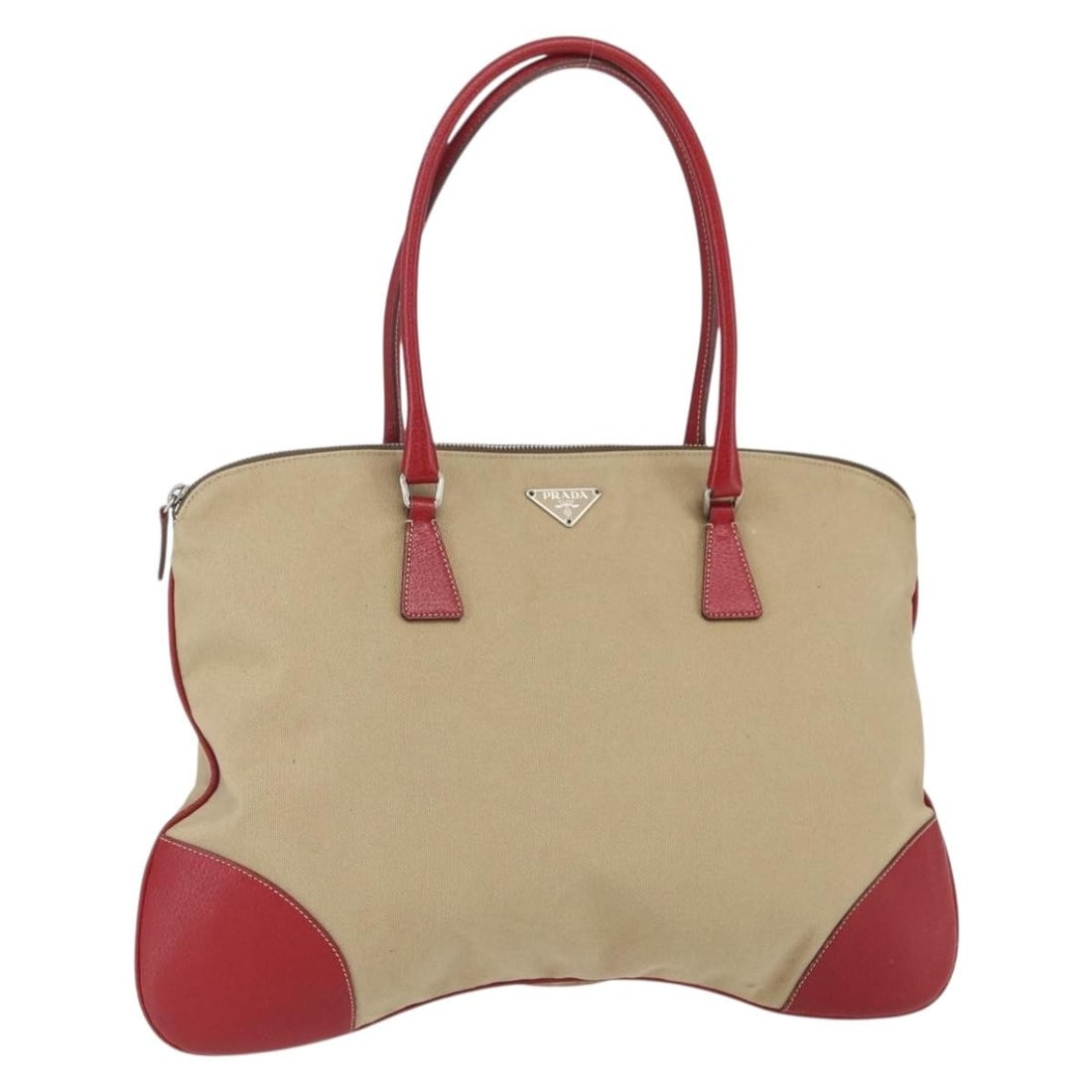Beige Canvas Vintage Handbag by Prada 44cm x 31cm Italy: Beige Canvas Vintage Handbag by Prada 44cm x 31cm Italy This Prada vintage handbag is crafted from beige canvas and designed for women. It features signs of prior use, including surface rubbing, shape