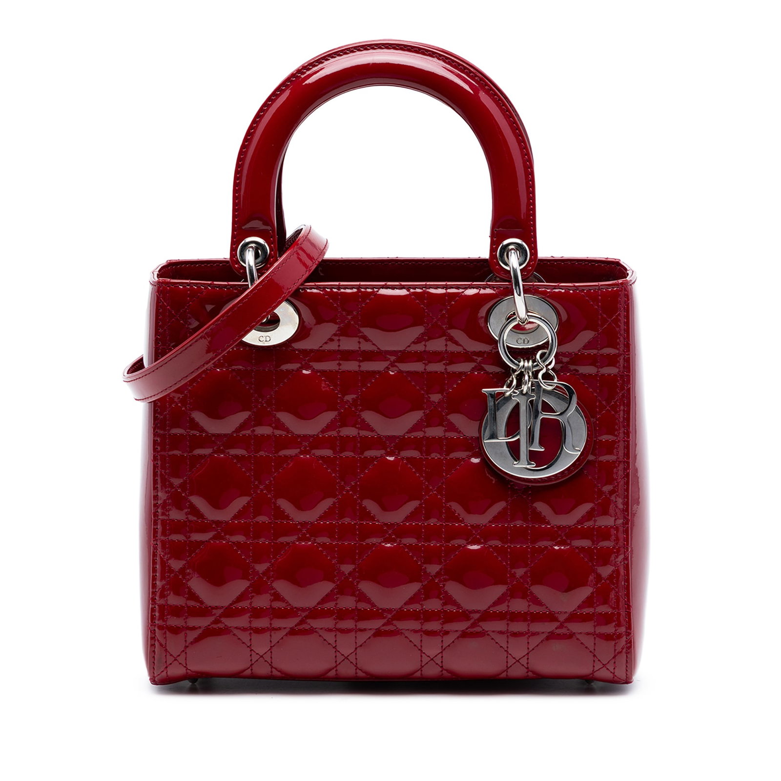 Red Patent Leather Lady Dior Medium Bag with Cannage Quilting: Red Patent Leather Lady Dior Medium Bag with Cannage Quilting This Lady Dior handbag features a quilted red patent leather exterior with flat leather top handles and a detachable flat leather strap. I