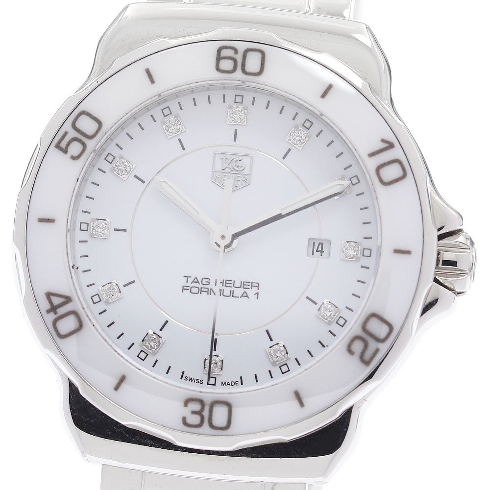 Tag Heuer Formula 1 Quartz Date Womens Stainless Steel Ceramic Watch: Tag Heuer Formula 1 Quartz Date Womens Stainless Steel Ceramic Watch This TAG Heuer Formula 1 Date Quartz women's wristwatch features a stainless steel and ceramic case and bracelet, complemented by a