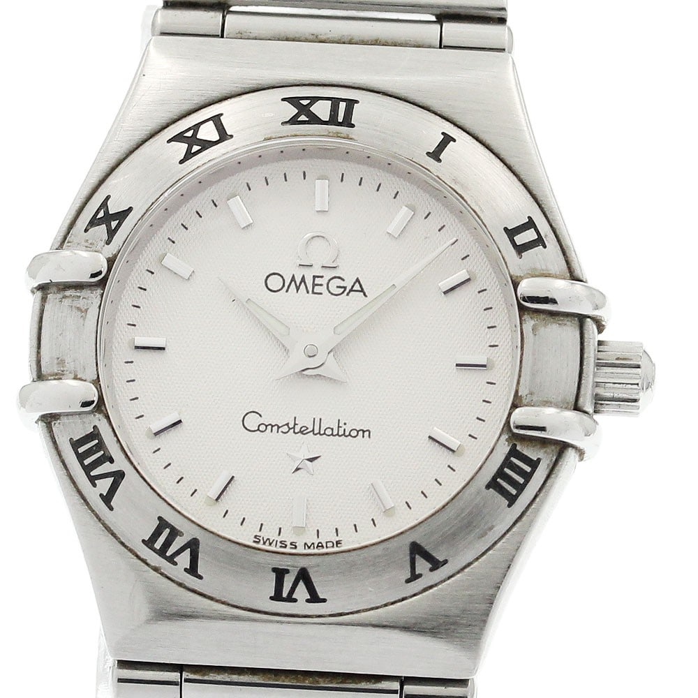 Omega Constellation Mini 1562.30 Quartz Steel Women's Wristwatch: Omega Constellation Mini 1562.30 Quartz Steel Women's Wristwatch This OMEGA Constellation Mini Quartz women's wristwatch features a stainless steel case and bracelet, complemented by a silver dial. Th