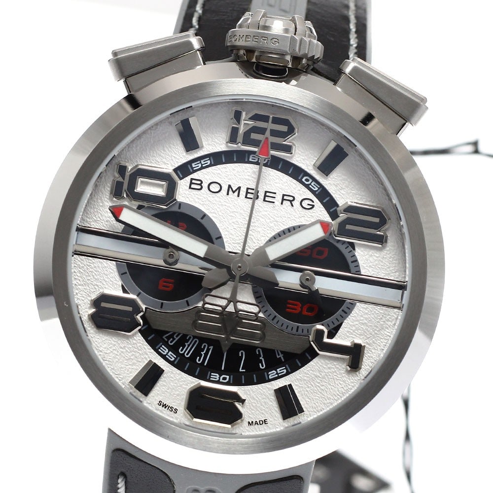 BOMBERG 1968 Quartz Chronograph Date Men's Stainless Steel Watch: BOMBERG 1968 Quartz Chronograph Date Men's Stainless Steel Watch This BOMBERG 1968 chronograph wristwatch features a durable stainless steel case and a white dial with chronograph, date, and small sec