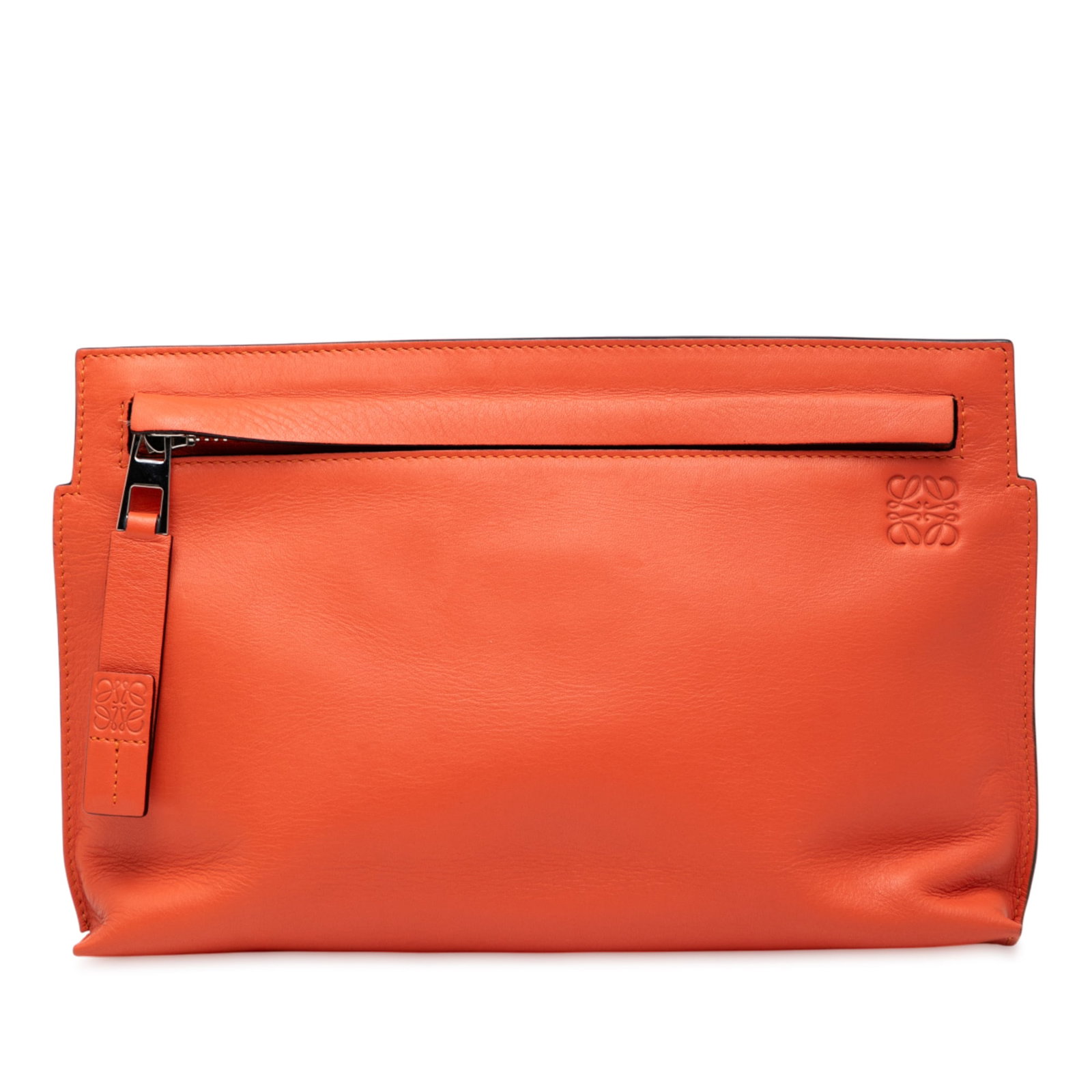 LOEWE Mini Leather T Pouch Clutch in Orange: LOEWE Mini Leather T Pouch Clutch in Orange The LOEWE Mini Leather T Pouch is a stylish clutch bag crafted from high-quality leather. This eye-catching orange pouch features a top zip closure for secu