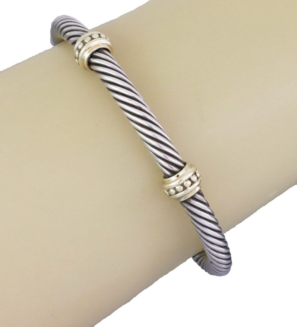 David Yurman Sterling Silver Cable Cuff with 14k Gold Beads: David Yurman Sterling Silver Cable Cuff with 14k Gold Beads This authentic David Yurman cable cuff bracelet features the brand's signature twisted helix design, expertly crafted in sterling silver wit