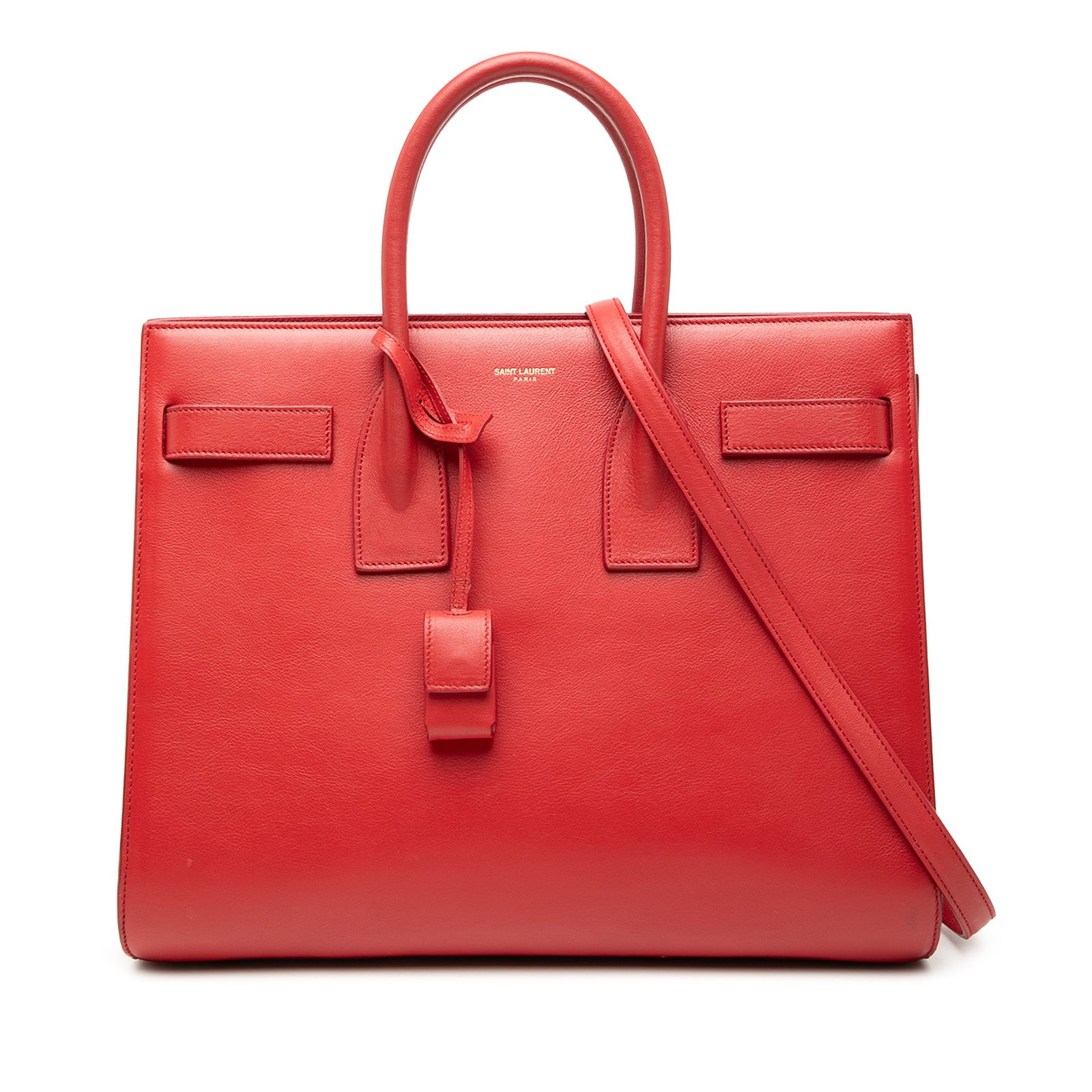 Red Leather Small Sac De Jour Satchel by Saint Laurent: Red Leather Small Sac De Jour Satchel by Saint Laurent This Saint Laurent Small Leather Sac De Jour Satchel features a red leather body with rolled leather handles and a detachable flat leather strap.