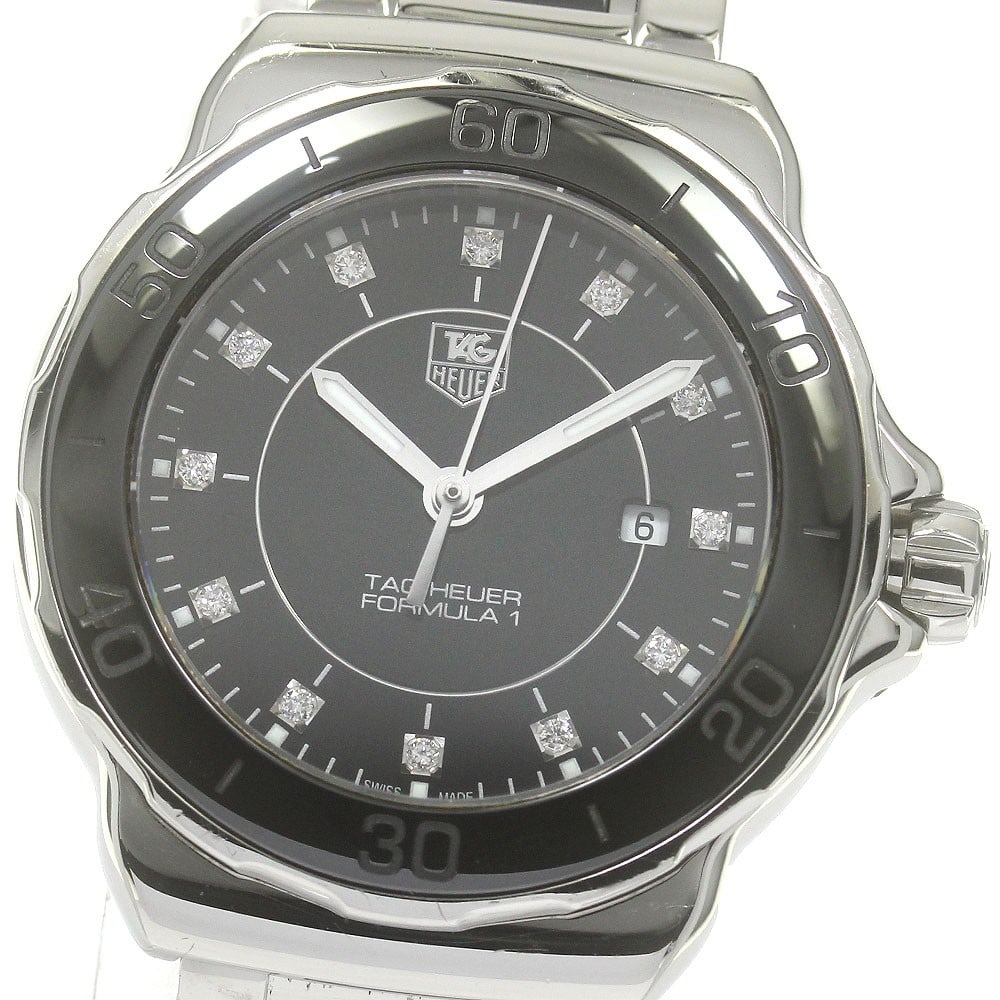 TAG Heuer Formula 1 women's quartz wristwatch WAH1314.BA0867: TAG Heuer Formula 1 women's quartz wristwatch WAH1314.BA0867 This TAG Heuer Formula 1 Quartz women's wristwatch, model WAH1314.BA0867, features a stainless steel and ceramic case and band with a sleek