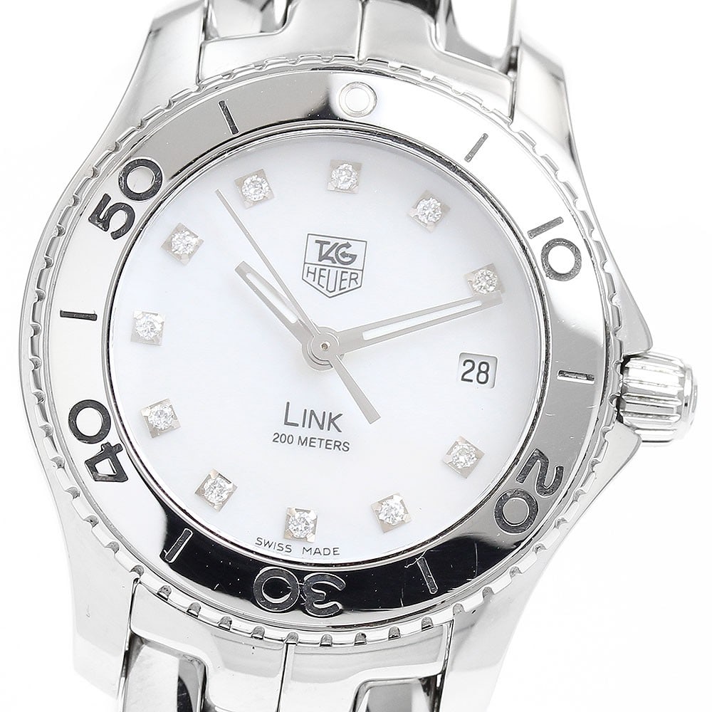 TAG Heuer Link Quartz Women Watch WJ1319-0 Stainless Steel Date: TAG Heuer Link Quartz Women Watch WJ1319-0 Stainless Steel Date This TAG HEUER Link WJ1319-0 is a women's wristwatch featuring a stainless steel case and bracelet with a white mother-of-pearl dial. Th