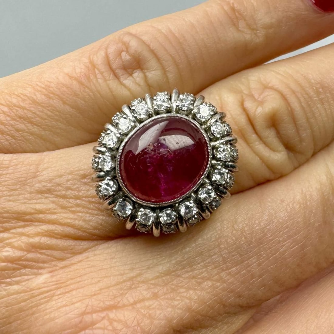 3.00 Ct Oval Ruby & 1.20 Ct Diamond Platinum Cocktail Ring: 3.00 Ct Oval Ruby & 1.20 Ct Diamond Platinum Cocktail Ring This exquisite Ruby & Diamond Cocktail Ring features a stunning 3.00 Ct oval cabochon ruby, elegantly complemented by 48 round diamonds with 