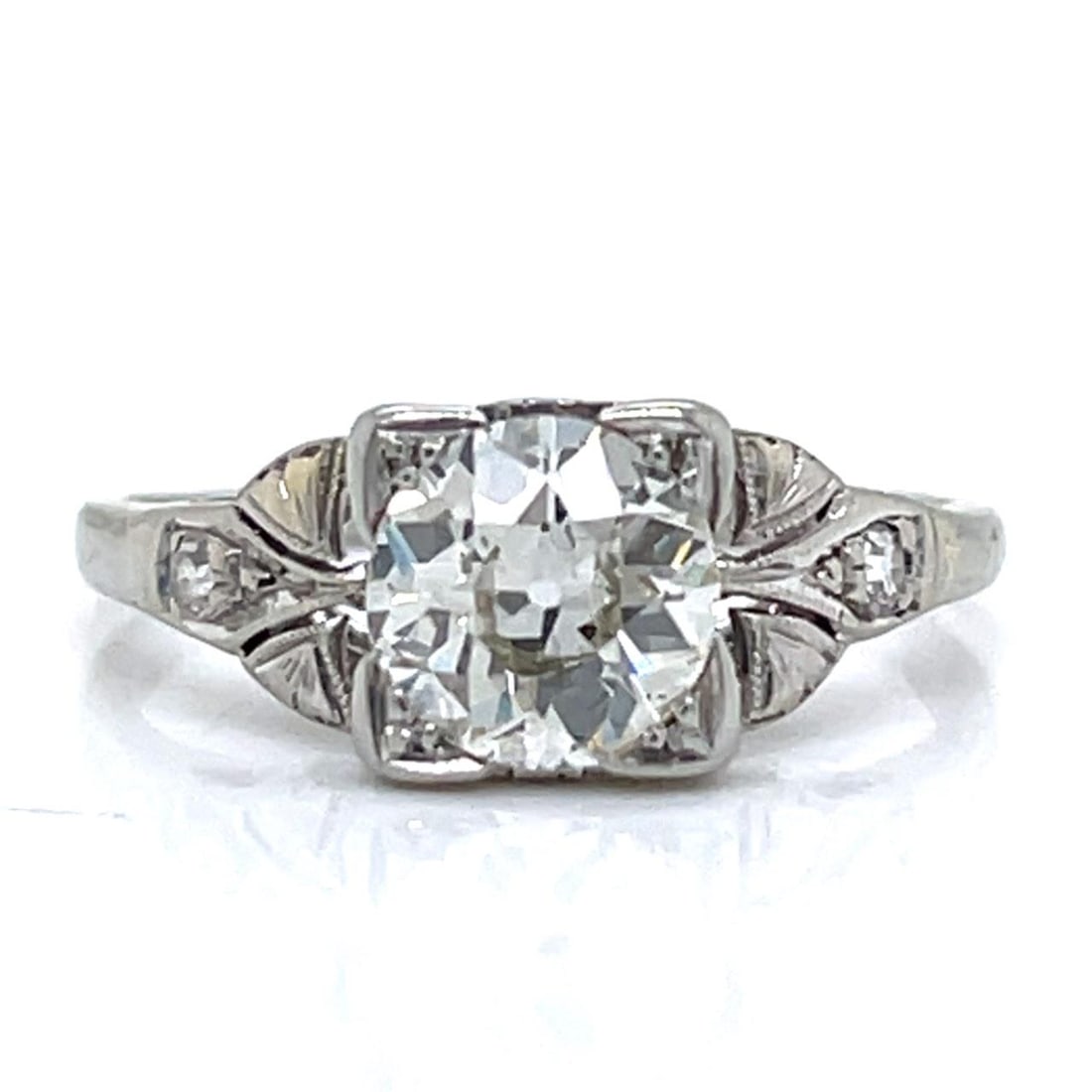 Platinum Art Deco Ring with 0.95 Carat European Cut Diamond: Platinum Art Deco Ring with 0.95 Carat European Cut Diamond This Art Deco engagement ring is crafted from platinum and features an approximately 0.95 carat European-cut diamond with J-K color and SI2 