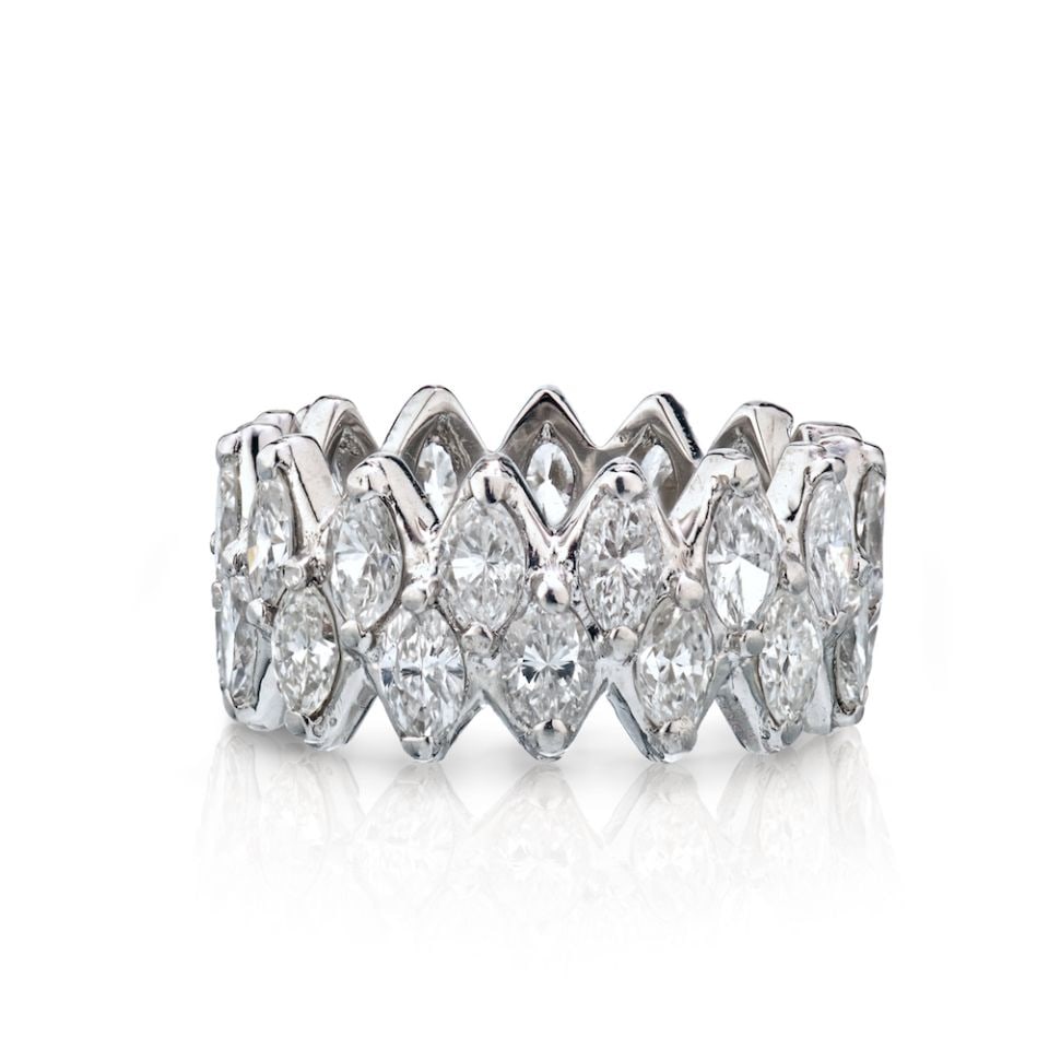 Elegant 1980s Platinum Marquise Diamond Eternity Band 7.50 cttw: Elegant 1980s Platinum Marquise Diamond Eternity Band 7.50 cttw This exquisite platinum eternity band, dating back to the 1980s, showcases a stunning array of marquise cut diamonds. With an approximat