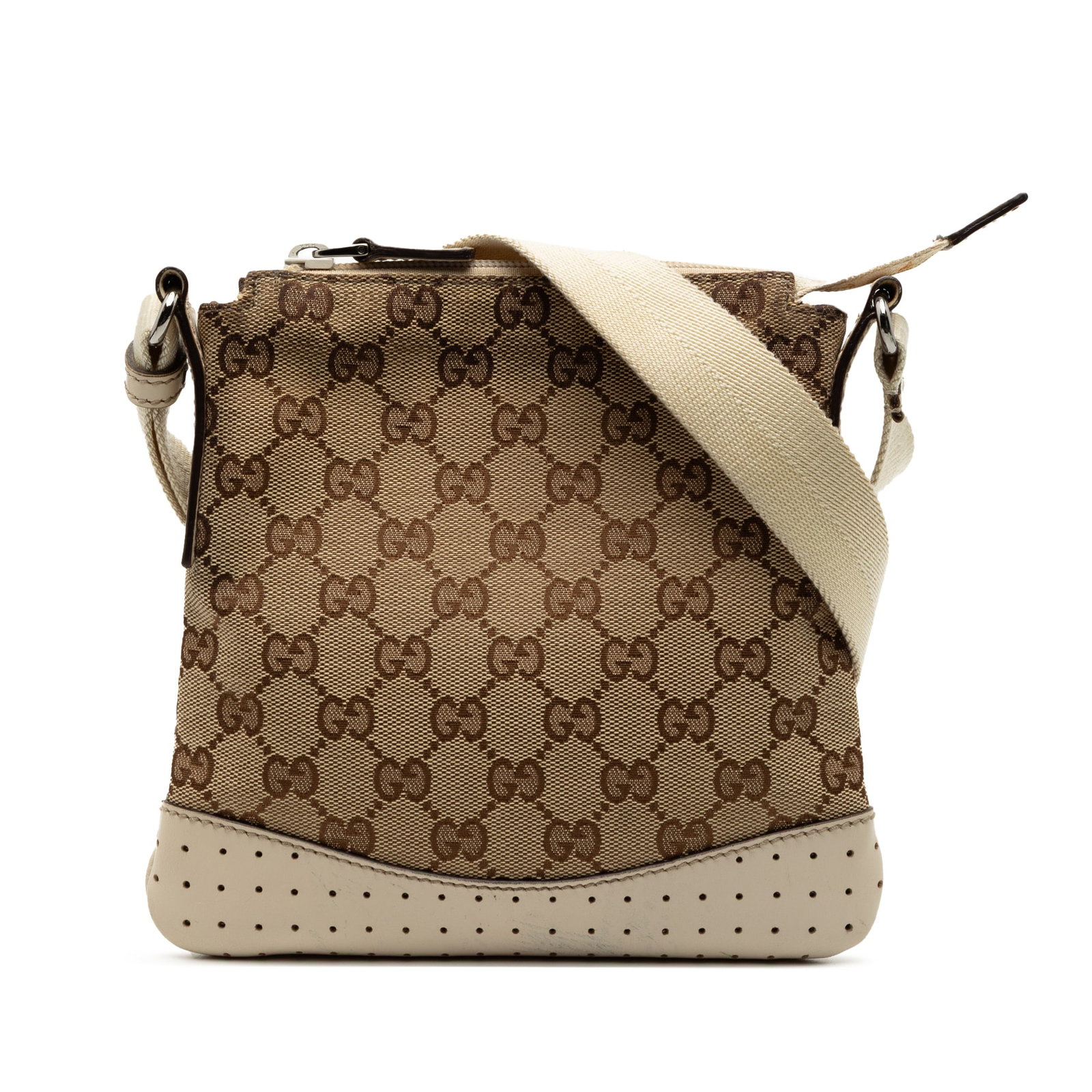 Gucci Brown GG Canvas Perforated Pattern Adjustable Strap Crossbody Bag: Gucci Brown GG Canvas Perforated Pattern Adjustable Strap Crossbody Bag This Gucci GG Canvas Perforated Crossbody bag features a brown canvas body with leather trim, an adjustable flat canvas shoulder