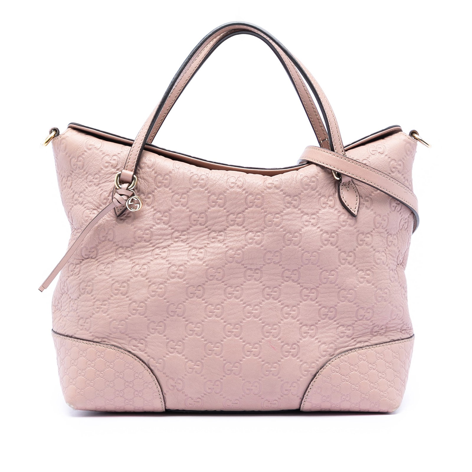 Gucci Bree Pink Leather Guccissima Medium Tote with Fold Over Top: Gucci Bree Pink Leather Guccissima Medium Tote with Fold Over Top The Medium Guccissima Bree Fold Over Tote features an embossed leather body in pink, flat leather handles, a detachable flat leather s