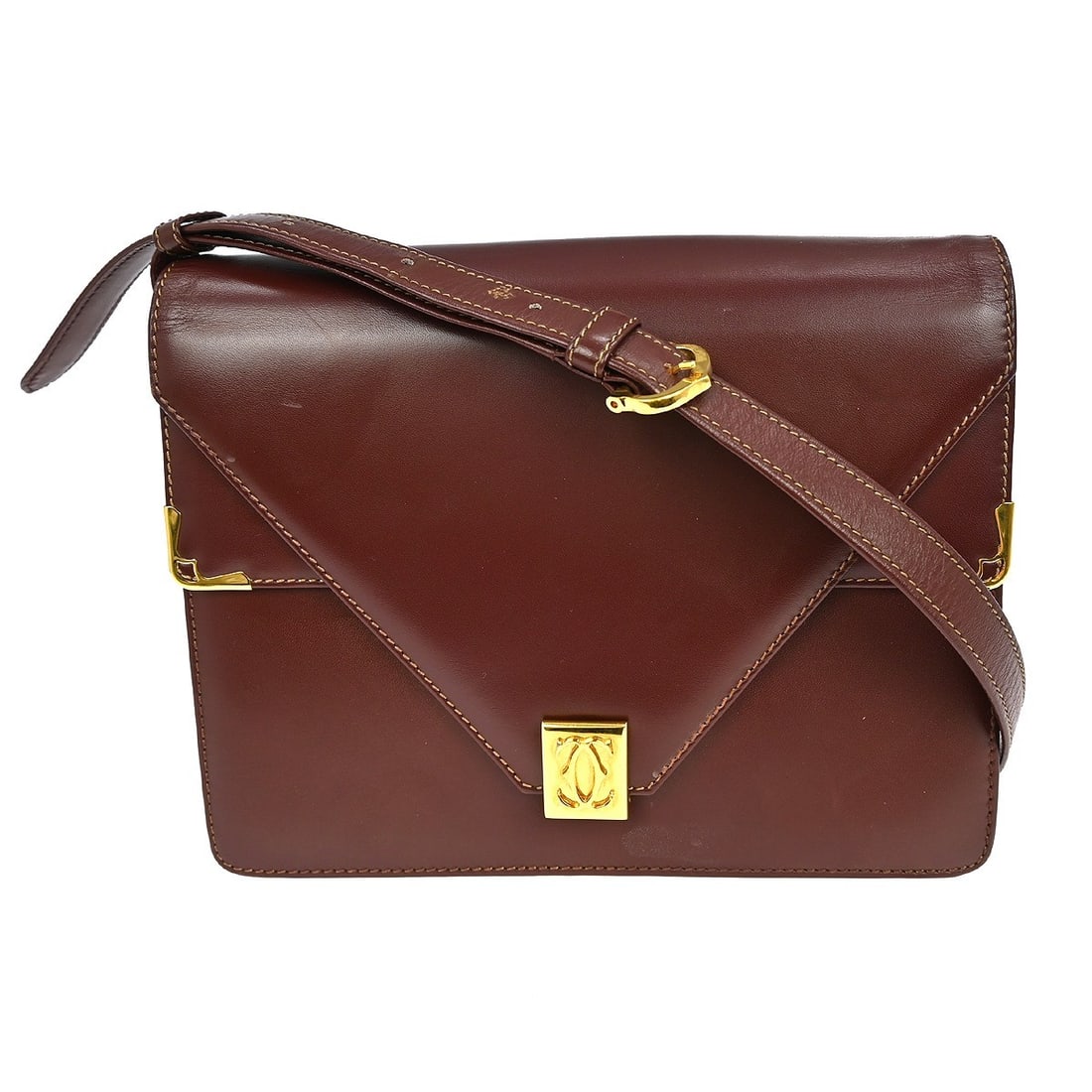 Cartier Bordeaux Leather Crossbody Shoulder Bag: Cartier Bordeaux Leather Crossbody Shoulder Bag This vintage Cartier Bordeaux shoulder bag features a classic design crafted from leather with a crossbody strap for versatile carrying. The bag is styl