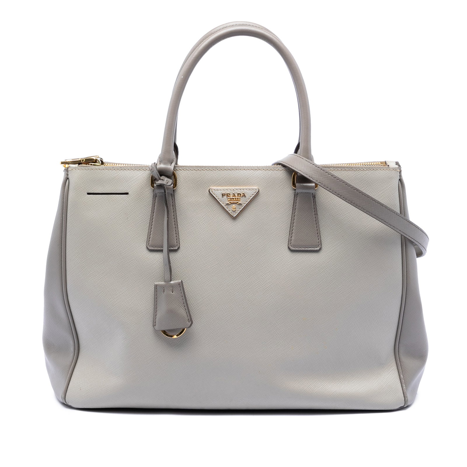 Prada Galleria Medium Saffiano Leather Satchel with Double Zip Compartments: Prada Galleria Medium Saffiano Leather Satchel with Double Zip Compartments This Prada Medium Bicolor Saffiano Lux Galleria Double Zip Satchel features a saffiano leather body with rolled leather hand