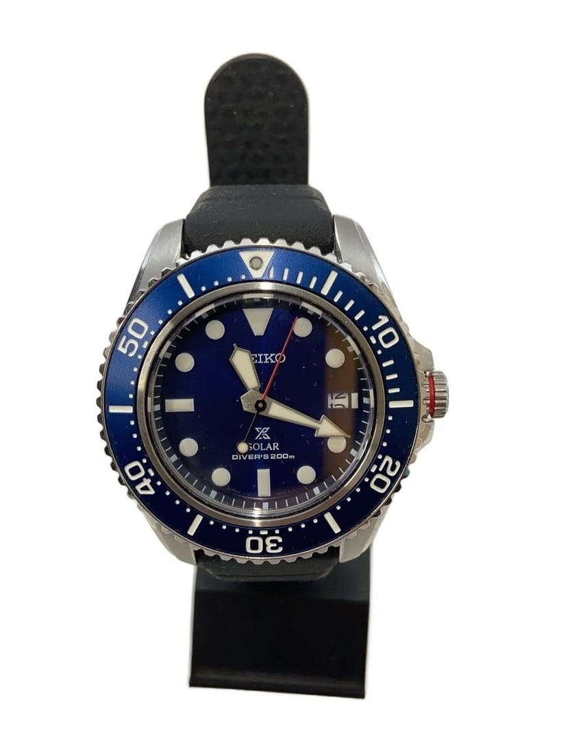 Seiko Prospex Quartz Diver Men's Wristwatch: Seiko Prospex Quartz Diver Men's Wristwatch This SEIKO Prospex Diver Scuba Quartz men's wristwatch is a pre-owned timepiece from Japan. It features a robust design with slight signs of use, reflecting