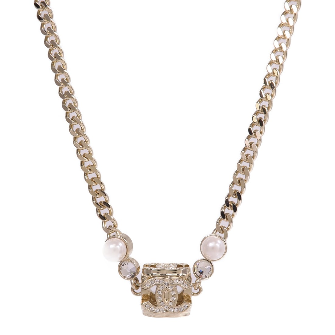 CHANEL Gold CC Pendant Necklace: CHANEL Gold CC Pendant Necklace This CHANEL CC necklace features a gold-tone finish and is crafted from non-specified metal. Designed for women, it showcases the iconic CC logo and does not include an