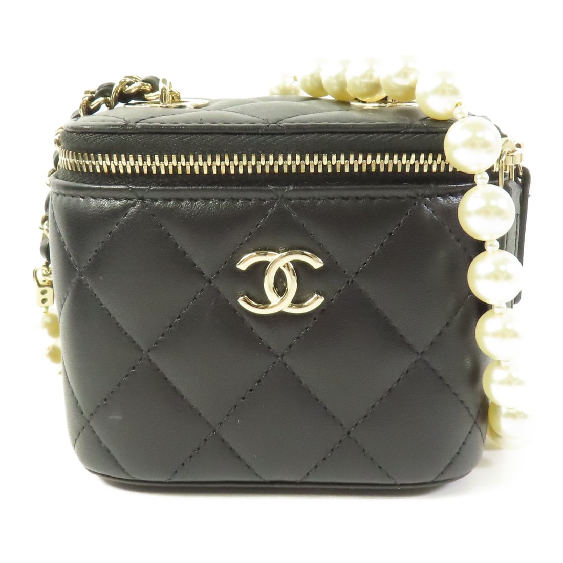 CHANEL Mini Vanity Case Shoulder Bag Black Lambskin Leather GHW: CHANEL Mini Vanity Case Shoulder Bag Black Lambskin Leather GHW Introducing the exquisite CHANEL CC Mini Vanity Case Shoulder Bag, crafted from luxurious lambskin leather in a classic black finish. Th