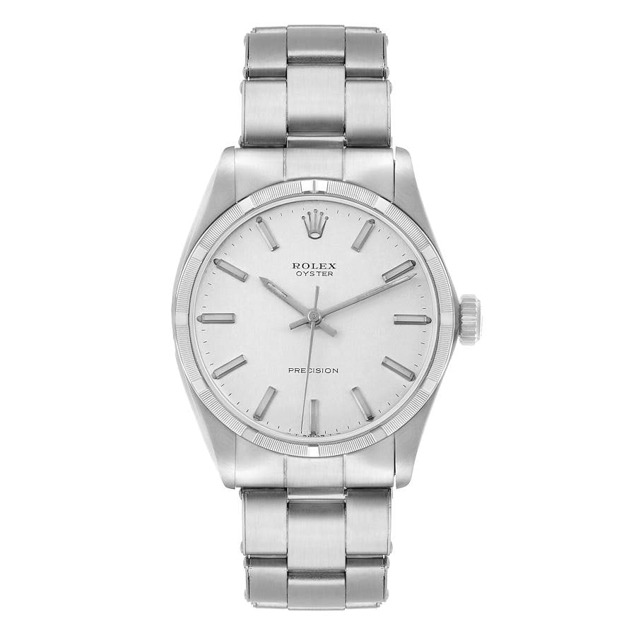 Rolex 6427 Oyster Precision Men's Watch Silver Dial With Service Papers 1970: Rolex 6427 Oyster Precision Men's Watch Silver Dial With Service Papers 1970 This Rolex Oyster Precision watch features a silver dial and an engine-turned bezel, presented on an Oyster bracelet. The t