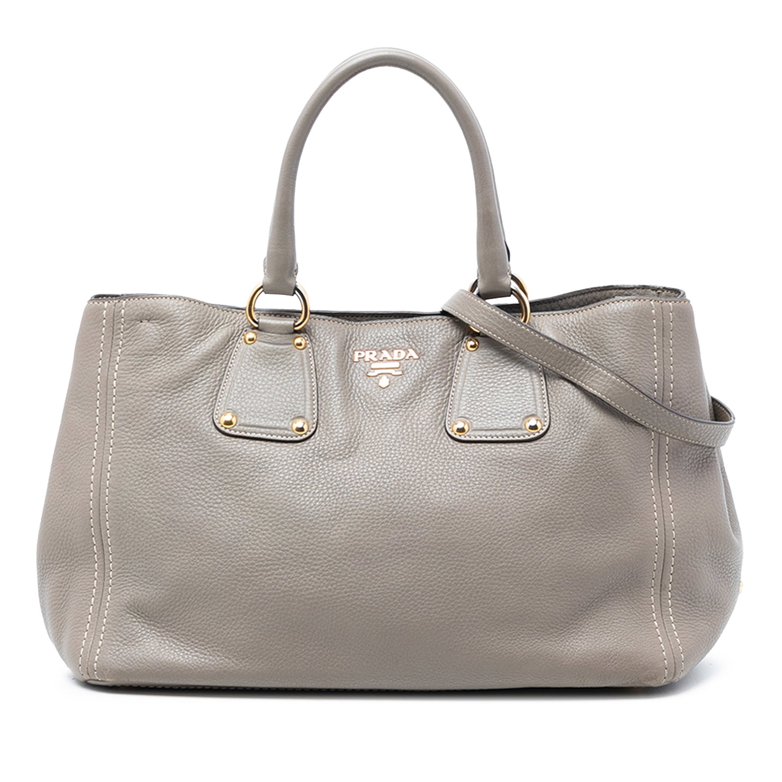 Prada Vitello Daino Leather Convertible Satchel with Shoulder Strap Gray: Prada Vitello Daino Leather Convertible Satchel with Shoulder Strap Gray This Prada Vitello Daino Open Convertible Tote is crafted from gray leather and features rolled handles and an adjustable, deta