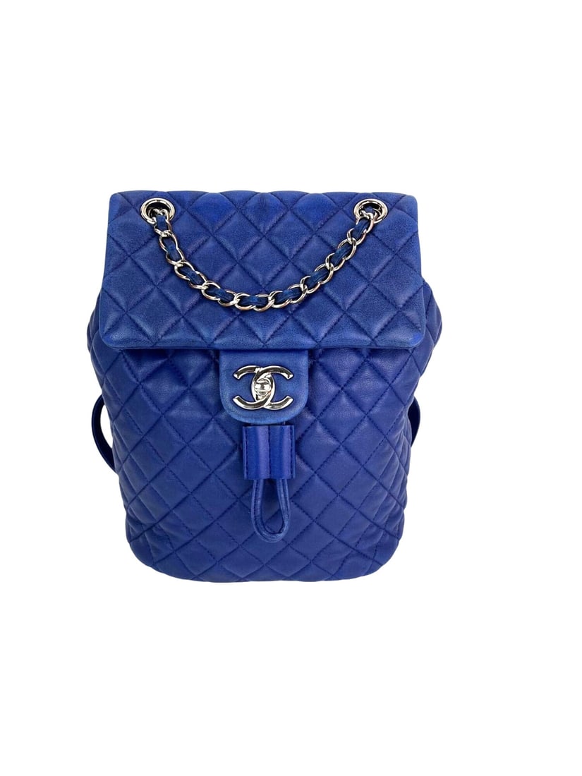 Chanel Urban Spirit Small Blue Quilted Backpack with Silver Hardware: Chanel Urban Spirit Small Blue Quilted Backpack with Silver Hardware This Chanel Lambskin Quilted Small Urban Spirit Backpack is a stylish accessory that combines functionality with a chic design. Cra