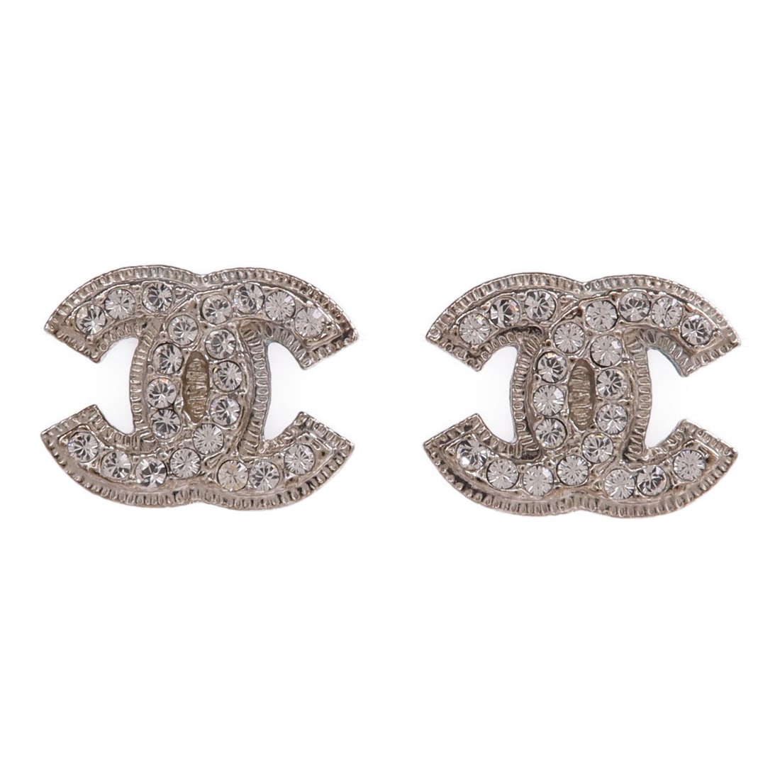 CHANEL Silver Pierced CC Earrings: CHANEL Silver Pierced CC Earrings These CHANEL CC pierced earrings feature a classic silver-tone finish and the iconic CC logo. Designed for women, they are crafted from non-specified metal and do not