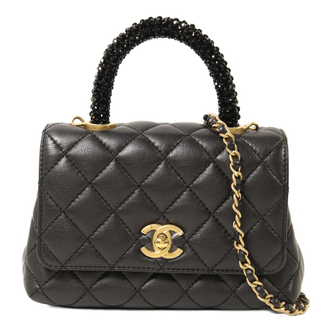 CHANEL Mini Coco Handle Black Calfskin 2-Way Shoulder Bag with Gold Hardware: CHANEL Mini Coco Handle Black Calfskin 2-Way Shoulder Bag with Gold Hardware This CHANEL mini Coco Handle 2-way chain shoulder bag is crafted from black calfskin leather and features gold-tone hardwar