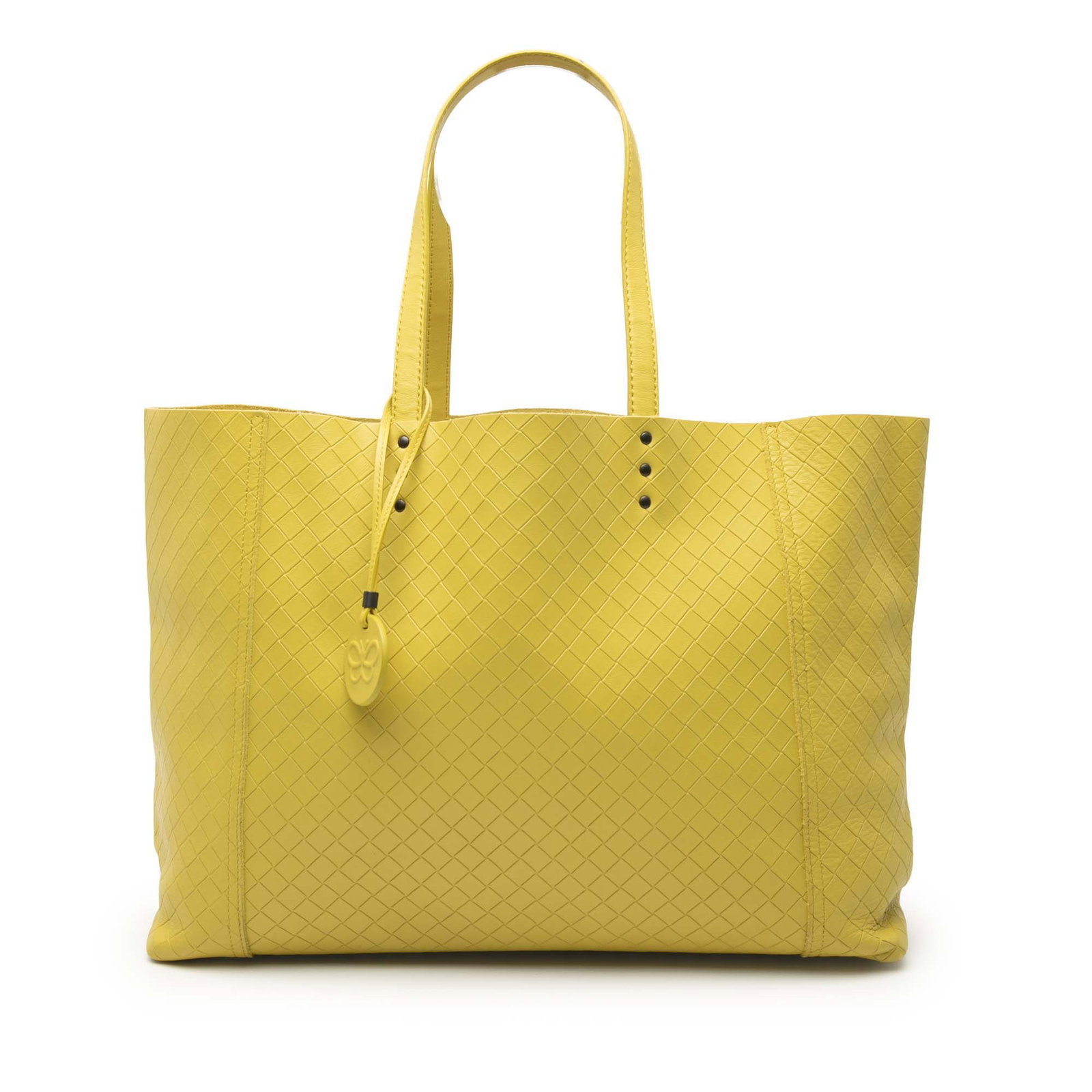 Yellow Intrecciomirage Leather Tote Bag by Bottega Veneta: Yellow Intrecciomirage Leather Tote Bag by Bottega Veneta This Bottega Veneta Leather Intrecciomirage Tote features an embossed leather exterior in yellow, flat leather shoulder straps, and an open to