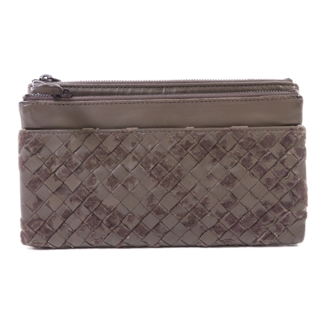 Green Intrecciato Leather and Velvet Long Bifold Wallet by Bottega Veneta: Green Intrecciato Leather and Velvet Long Bifold Wallet by Bottega Veneta This Bottega Veneta long wallet features the signature Intrecciato design crafted from green calfskin leather and velvet. Desi