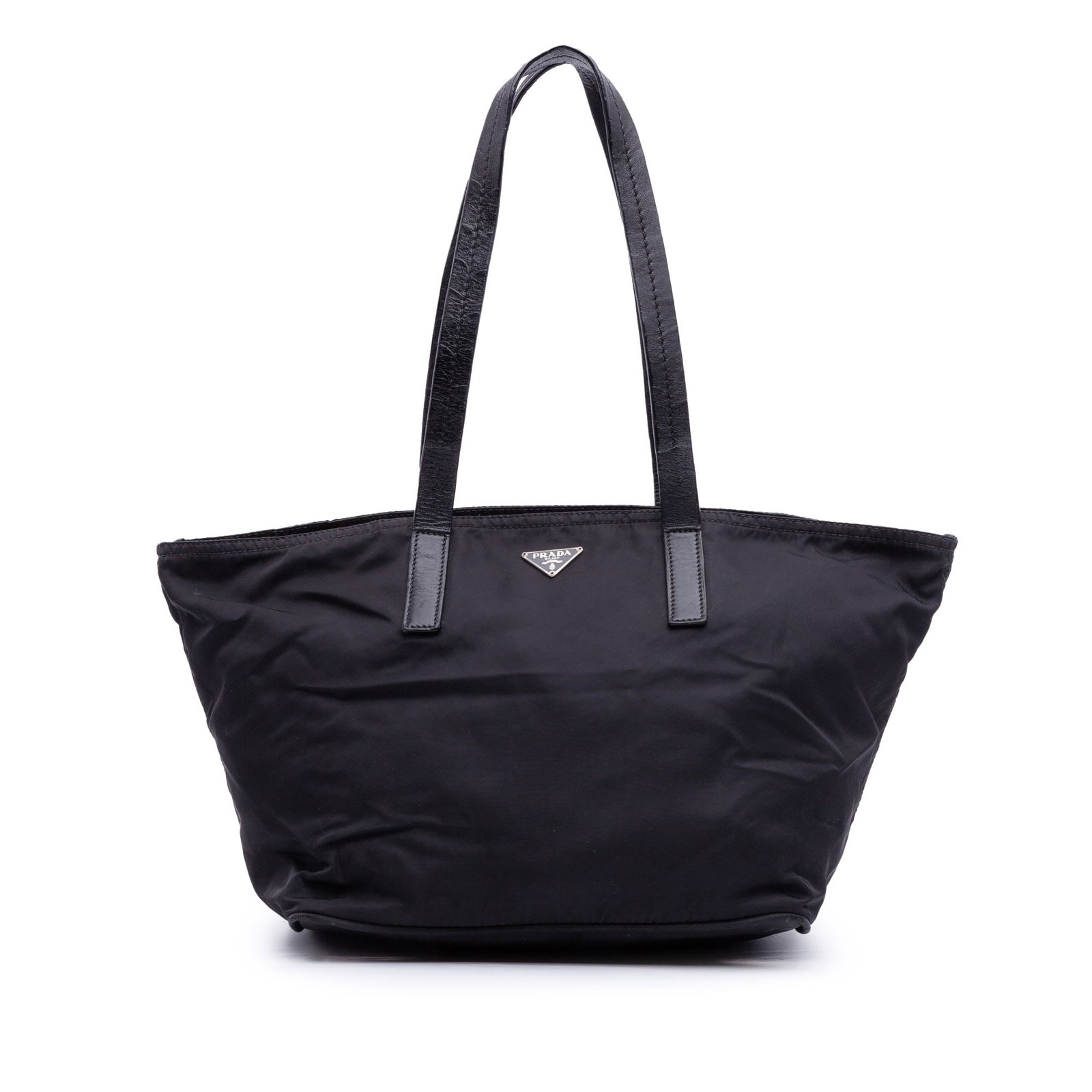Black Nylon Tote Bag Prada Tessuto Model with Leather Handles: Black Nylon Tote Bag Prada Tessuto Model with Leather Handles This Prada Tessuto Tote is crafted from black nylon with flat leather straps and a top zip closure. The interior includes a zip pocket for