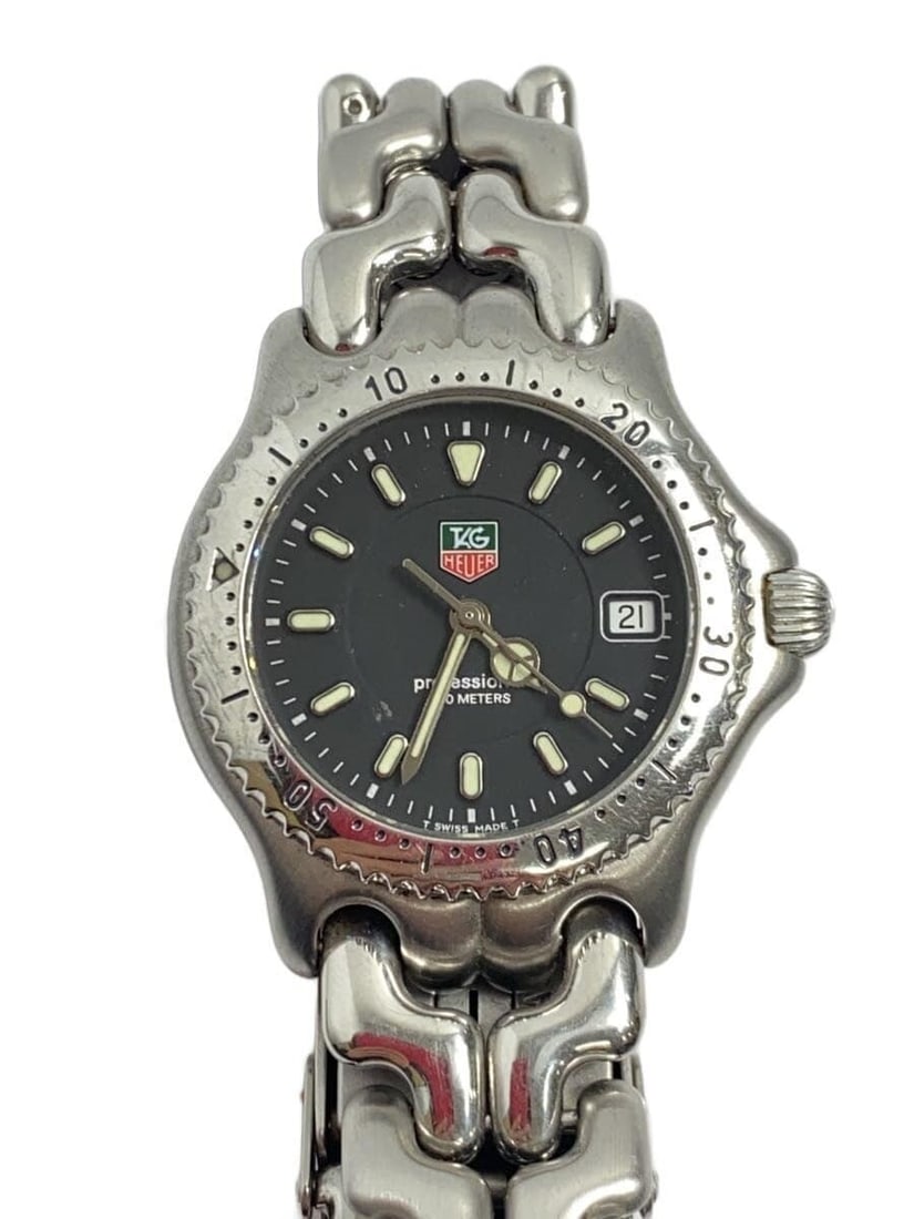 TAG Heuer S le Professional Black Stainless Steel Unisex Wristwatch: TAG Heuer S le Professional Black Stainless Steel Unisex Wristwatch This TAG HEUER S/el Series Professional WG1214-KO wristwatch is designed for unisex wear. Crafted from stainless steel, it features 