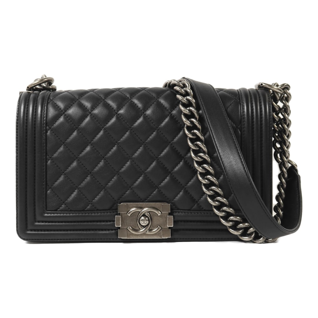 Chanel Boy 25 Black Lambskin Shoulder Bag with Silver Tone Hardware: Chanel Boy 25 Black Lambskin Shoulder Bag with Silver Tone Hardware This CHANEL CC Boy 25 Chain Shoulder Bag is crafted from black lambskin leather and features silver-tone hardware. Designed for wome