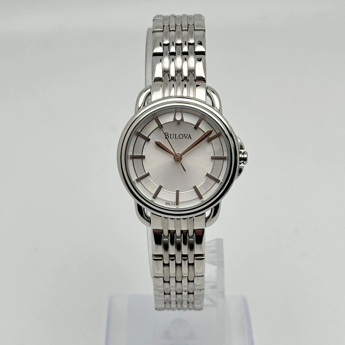 Bulova Dress Quartz Ladies Watch Silver Sunburst Dial 96L171 Stainless Steel: Bulova Dress Quartz Ladies Watch Silver Sunburst Dial 96L171 Stainless Steel Experience elegance and functionality with this Bulova Dress Ladies Watch. The timepiece features a stunning silver sunburs