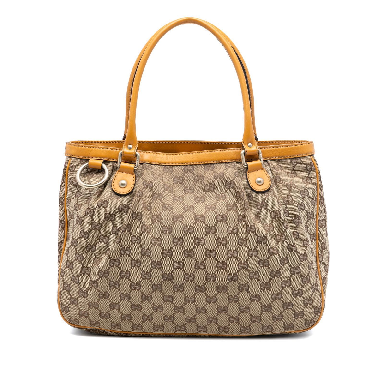 Gucci Sukey Tote Bag in GG Canvas and Leather Trim: Gucci Sukey Tote Bag in GG Canvas and Leather Trim This Gucci GG Canvas Sukey Tote features a canvas body with leather trim, rolled leather handles, an open top with magnetic snap closure, an interior