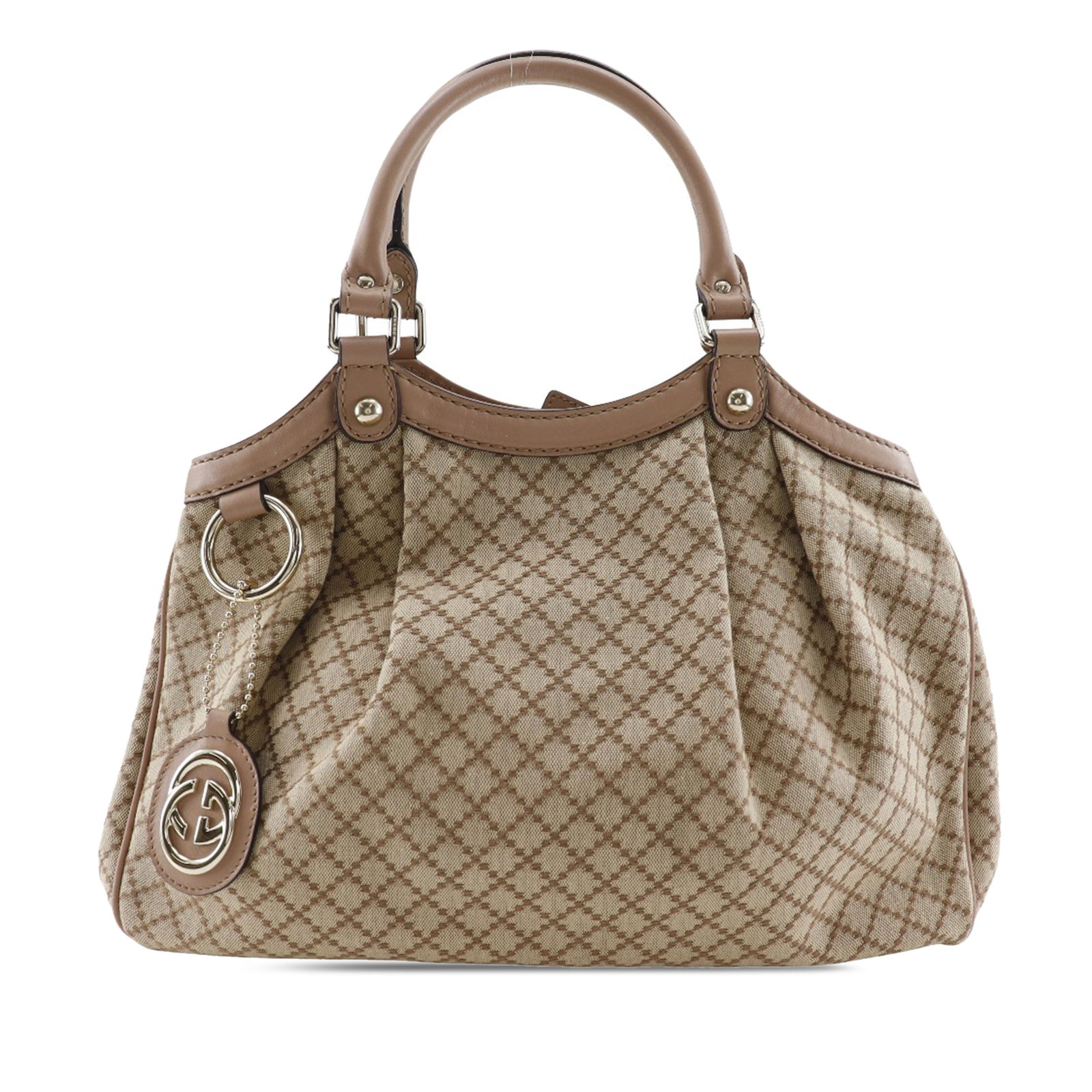 Beige Sukey Tote in Diamante Canvas with Leather Trim by Gucci: Beige Sukey Tote in Diamante Canvas with Leather Trim by Gucci This Gucci Medium Diamante Canvas Sukey Tote features a canvas body with leather trim, rolled leather handles, an open top with magnetic 