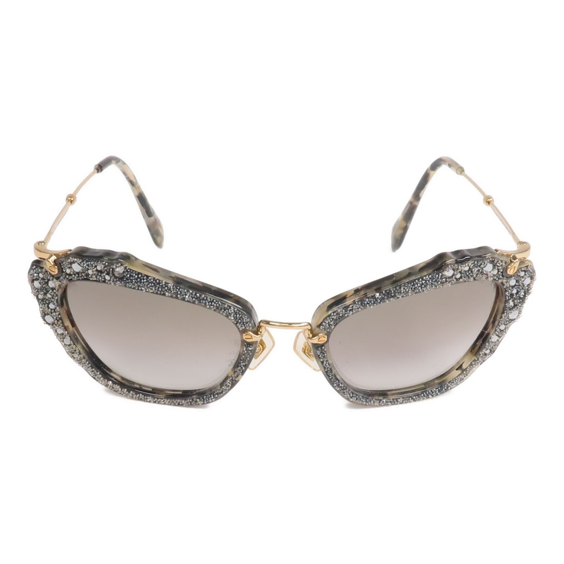 Miu Miu SMU04Q Gray Metal and PVC Women's Sunglasses: Miu Miu SMU04Q Gray Metal and PVC Women's Sunglasses These Miu Miu sunglasses feature a stylish gray frame crafted from PVC and metal. Designed for women, they offer a fashionable look with a regular 