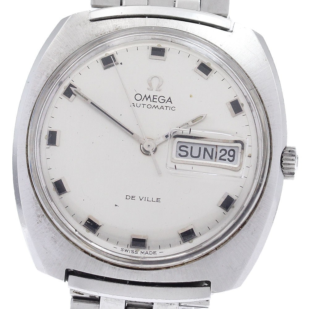 Omega De Ville Automatic Day Date Stainless Steel Wristwatch: Omega De Ville Automatic Day Date Stainless Steel Wristwatch This OMEGA De Ville Vintage Day-Date men's wristwatch features a stainless steel case and bracelet with a silver dial. The watch is equippe