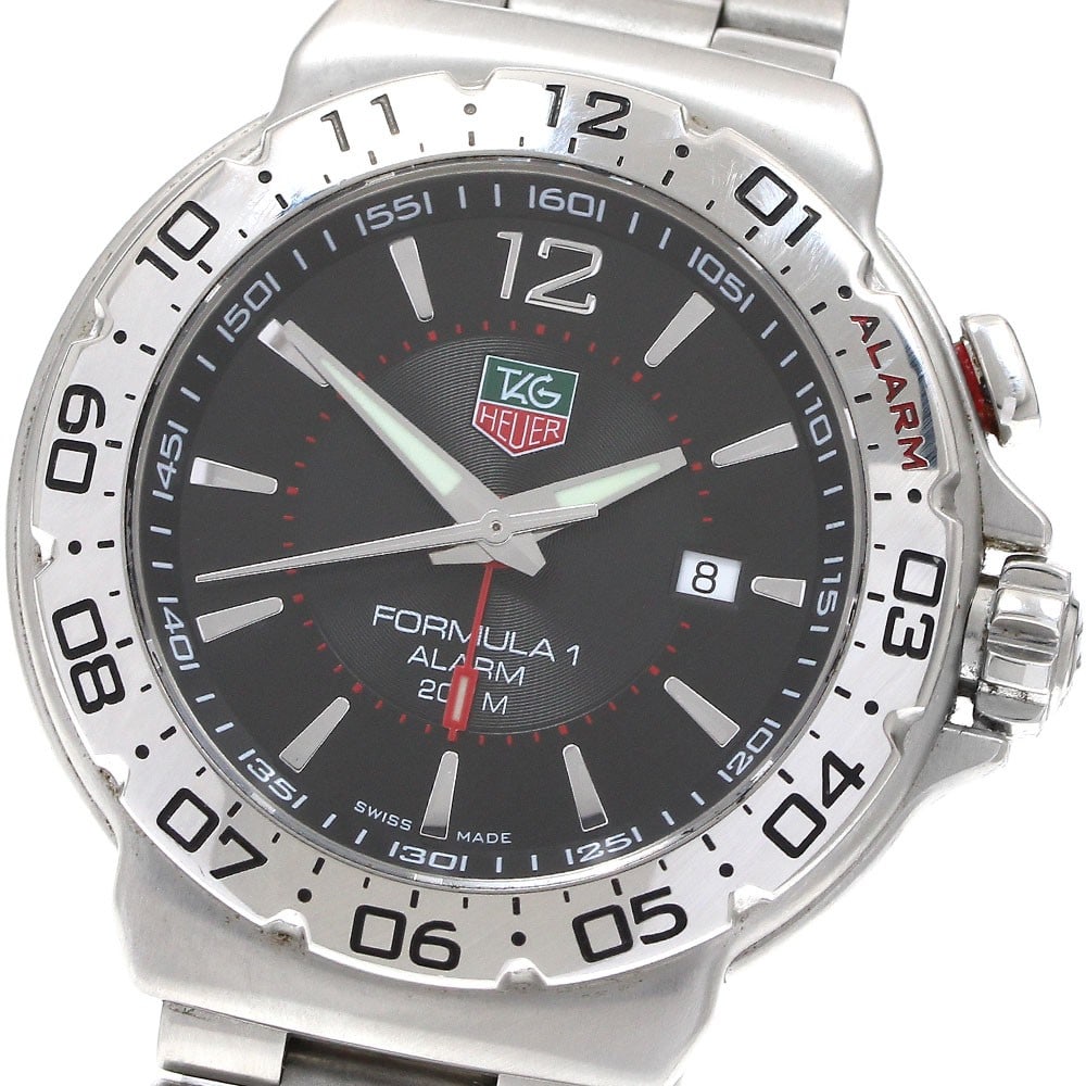 TAG Heuer Formula 1 Alarm Quartz Men's Stainless Steel Watch WAC111A: TAG Heuer Formula 1 Alarm Quartz Men's Stainless Steel Watch WAC111A This TAG Heuer Formula 1 Alarm Date Quartz men's wristwatch features a stainless steel case and bracelet with a black dial. The wat